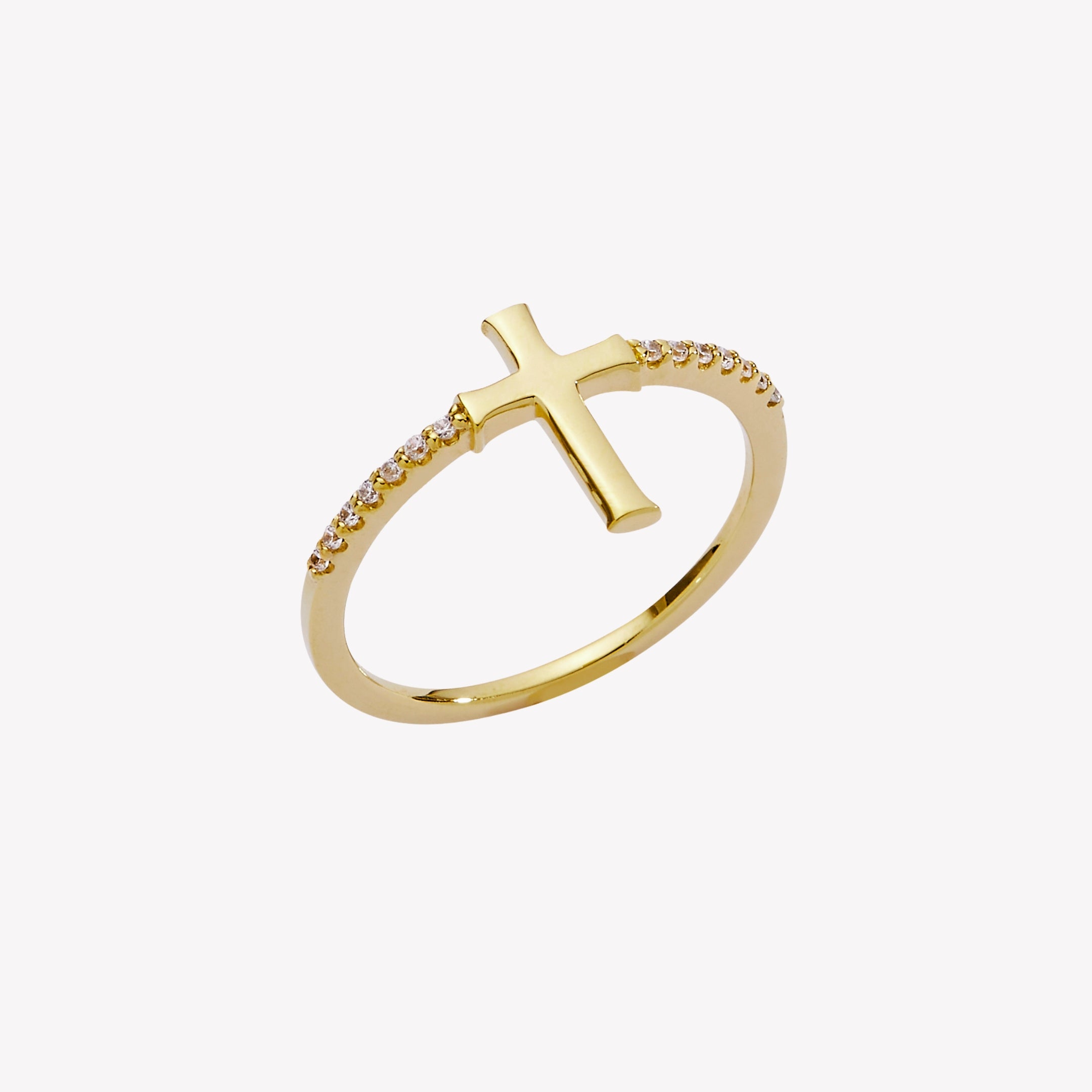 18k gold plated over sterling silver ring showcasing a cross motif centered between seven sparkling micro-set pavé zirconias on either side of the band. From the Insignia Collection by Rizen Jewelry.