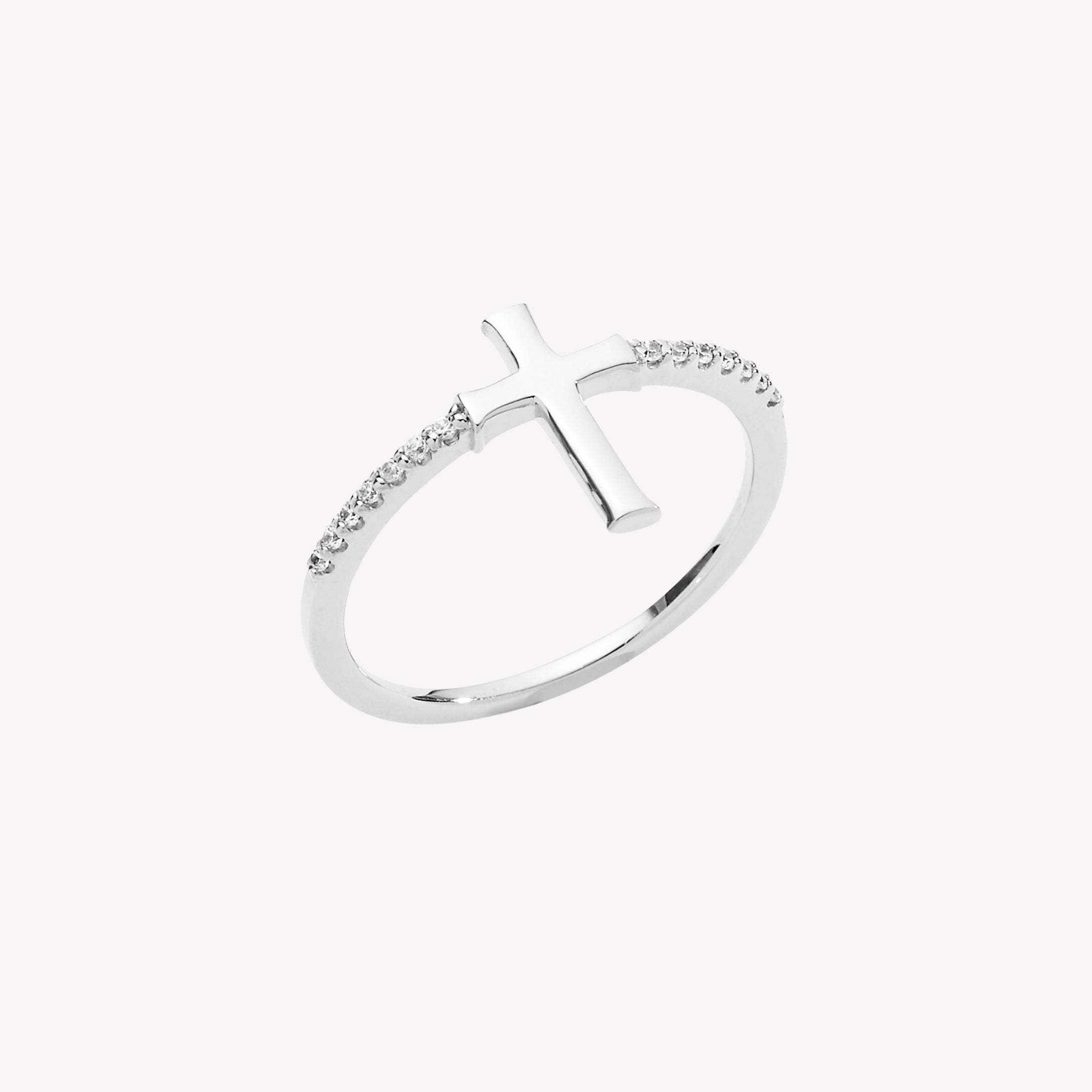 Sterling silver ring showcasing a cross motif centered between seven sparkling micro-set pavé zirconias on either side of the band from the Calvary Collection by Rizen Jewelry.
