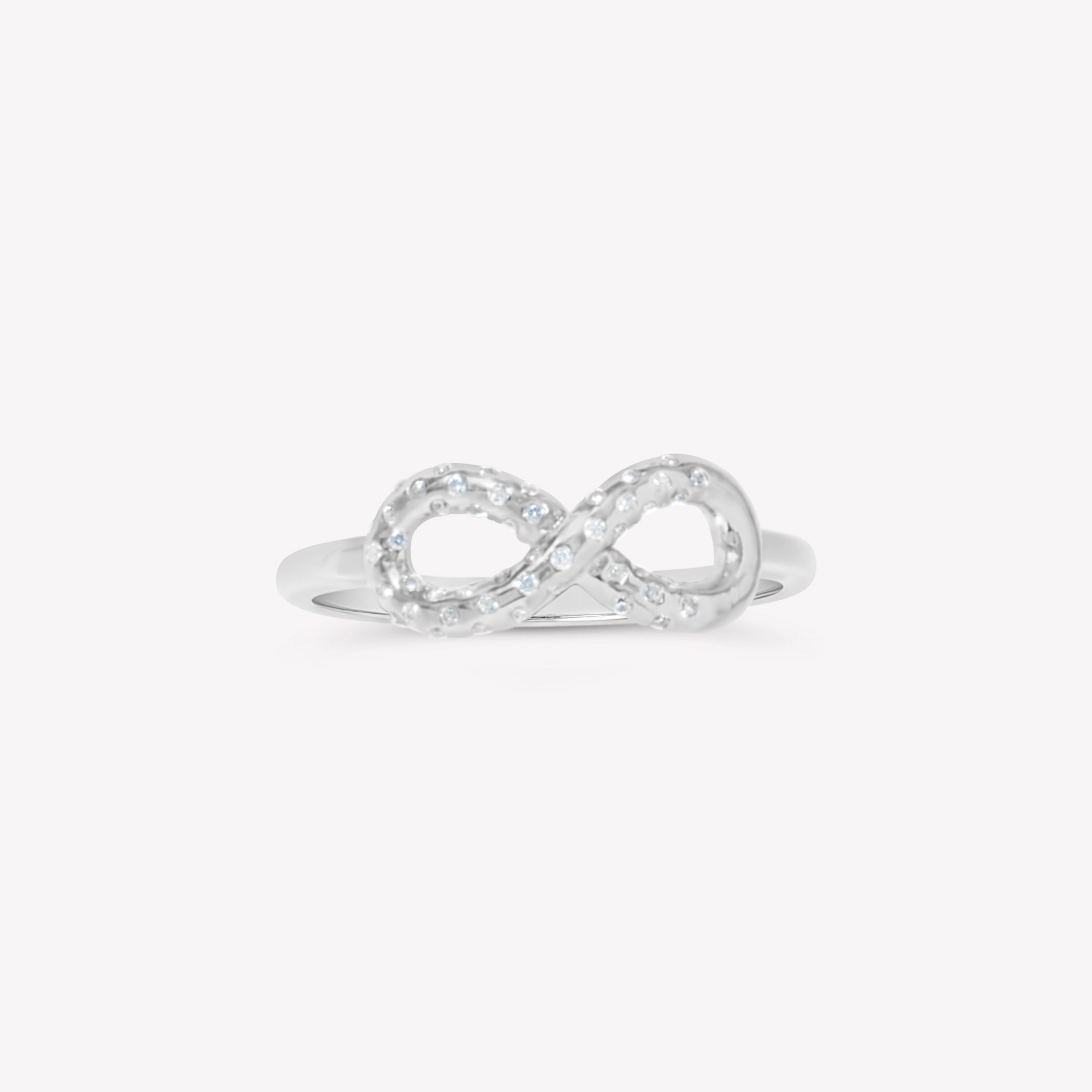 Sterling silver Infinite Hope Statement Ring showcases a pavé zirconia ichthys nestled within the infinity symbol by Rizen Jewelry
