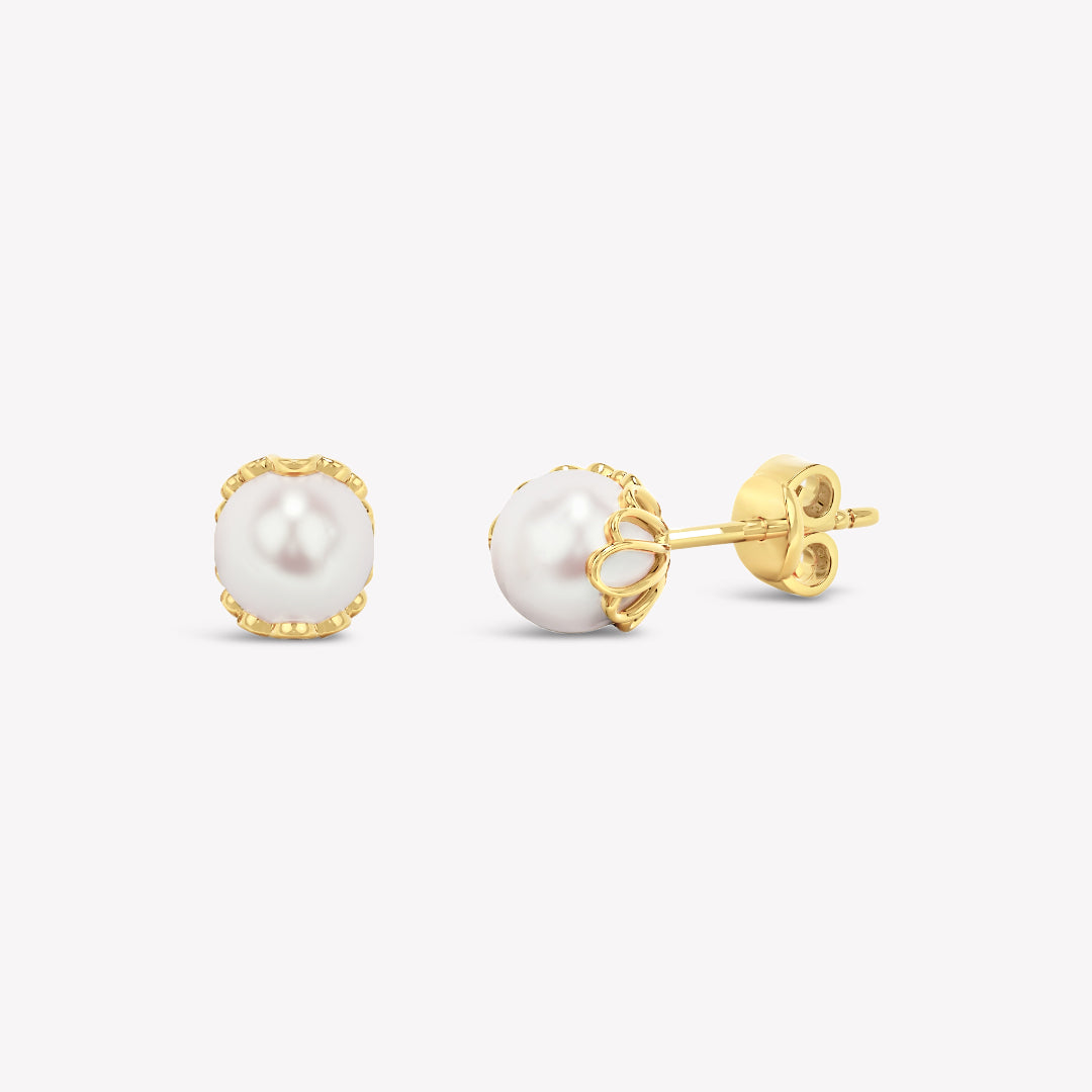 Rizen Jewelry gold shell encased pearl earring from the Becoming Collection.