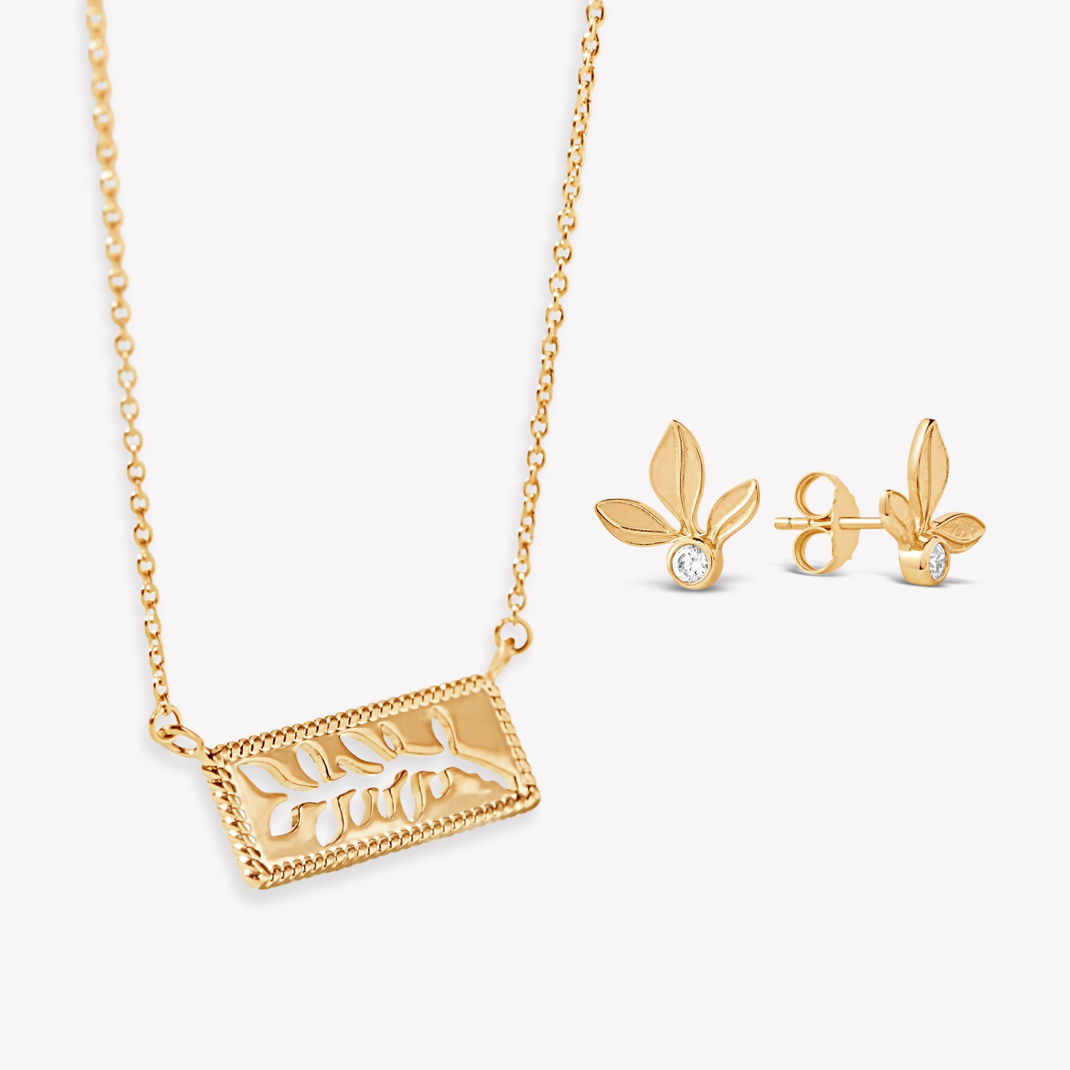 Serene Reverence Jewelry Set in 18k gold vermeil features the exquisite Olive Leaf Earrings and beautiful Branch Necklace make a perfect gift from the Rooted Collection by Rizen Jewelry.