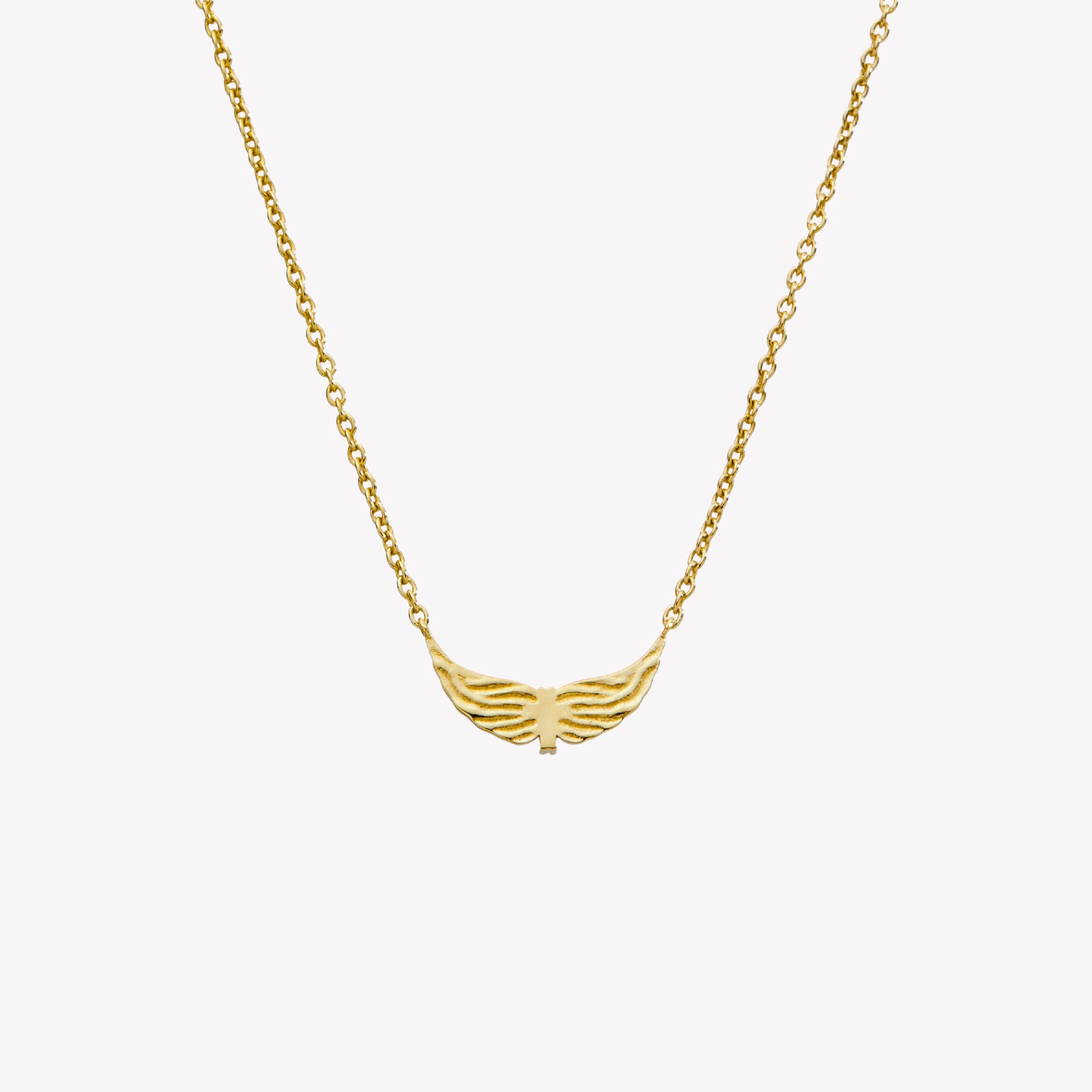 The backside of a 18k gold plated over sterling silver necklace featuring uplifted angel wings with a radiant cross at the center and textured feather detail. Set on an adjustable 19.5 in cable chain. From the Insignia Collection by Rizen Jewelry.