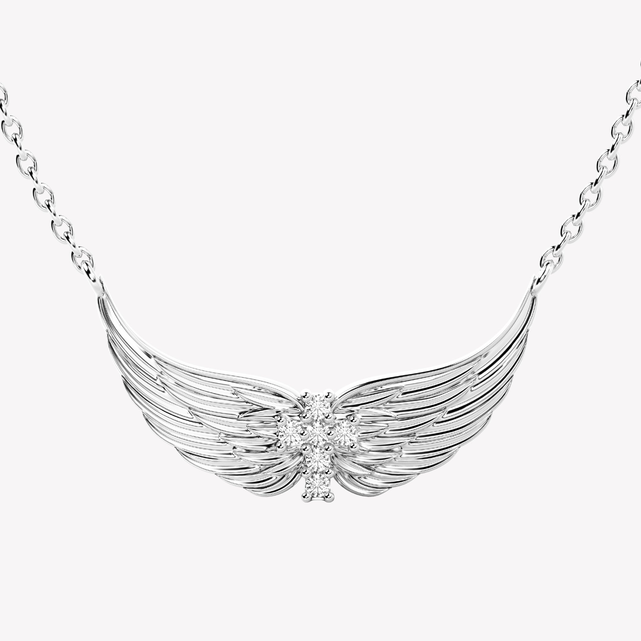 Close-up of the mini divine angel wings necklace with a radiant cross at the center of the uplifted wings by Rizen Jewelry.