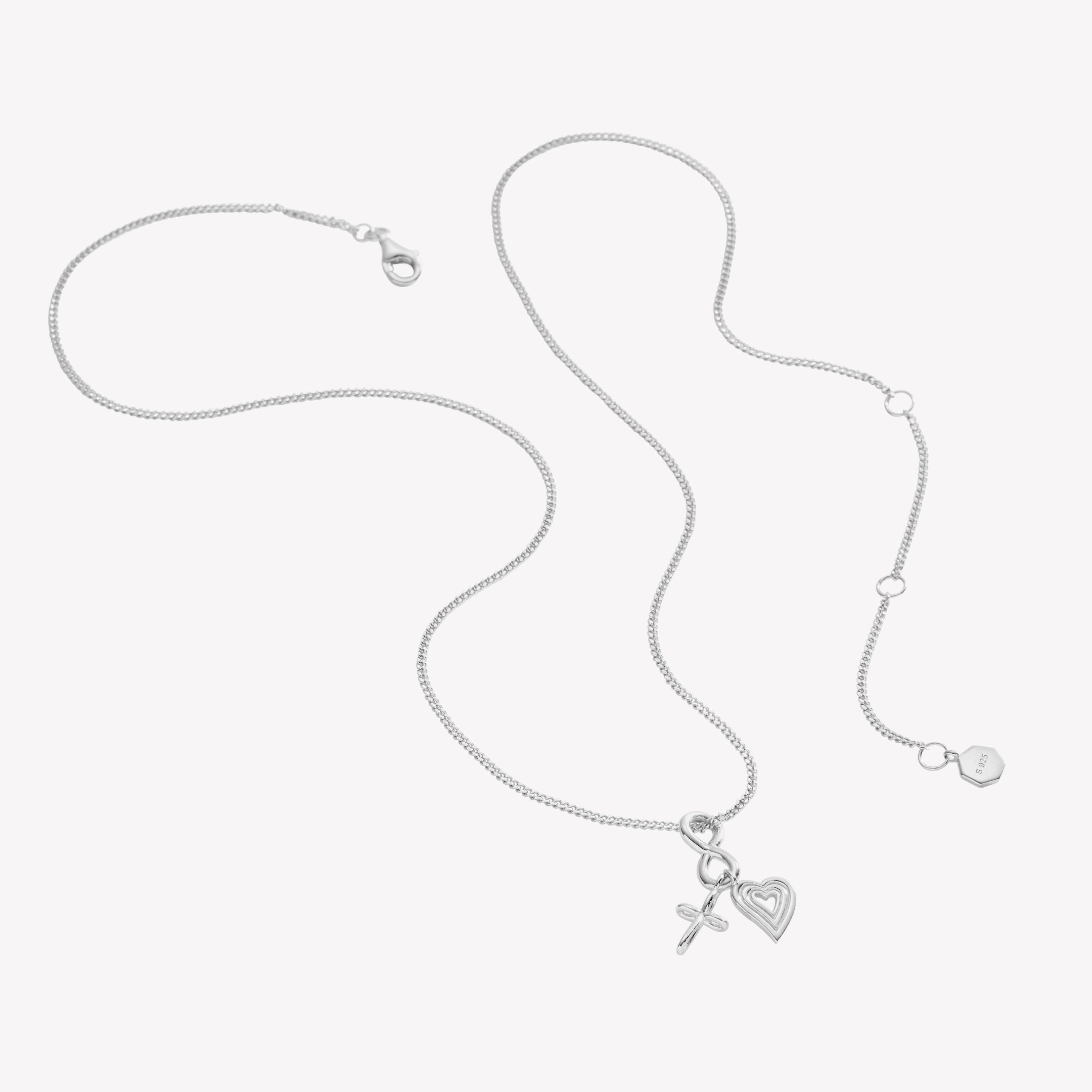 aith Hope Love Necklace featuring 3 charm pendants: an infinite cross for faith, an infinity for hope, and a radiating open heart for love set on a sterling silver cable chain adjustable to 3 different lengths by Rizen Jewelry