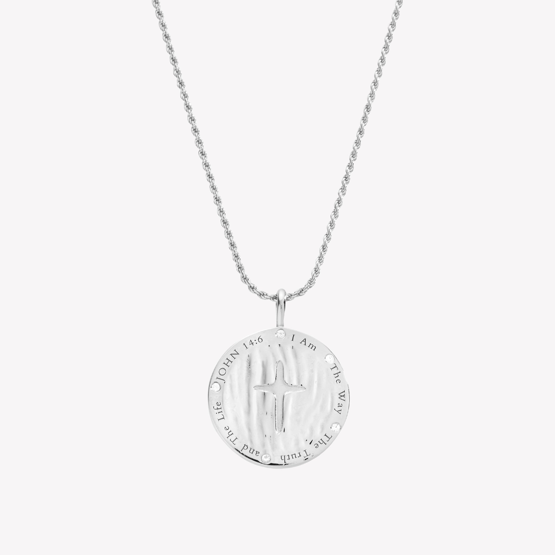 Back side of the  Sterling silver True Direction compass medallion necklace with "JOHN 14:6 I Am The Way The Truth and The Life"scripture etched on the back with 5 flush set cubic zirconias. Pendant is set on a 21in adjustable rope chain designed by Rizen Jewelry