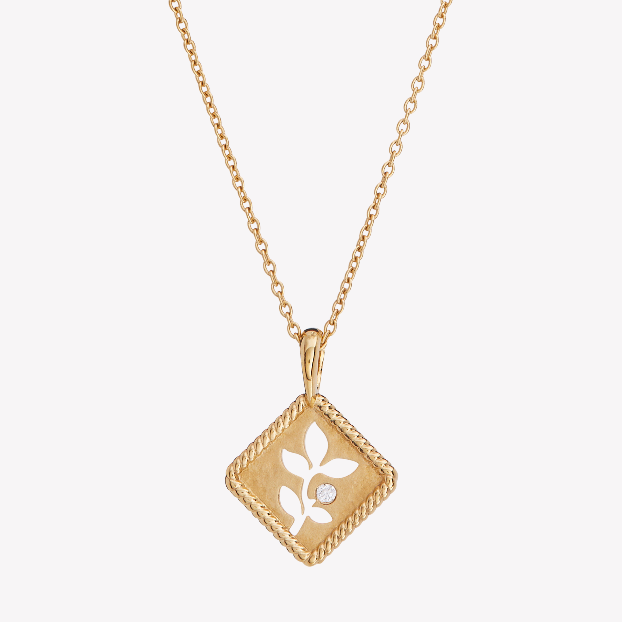 18k gold vermeil Olive Leaf Necklace with a subtle matte finish, intricate rope border in a diamond shape, and a flush set delicate cubic zirconiaset on a classic cable chain by Rizen Jewelry.