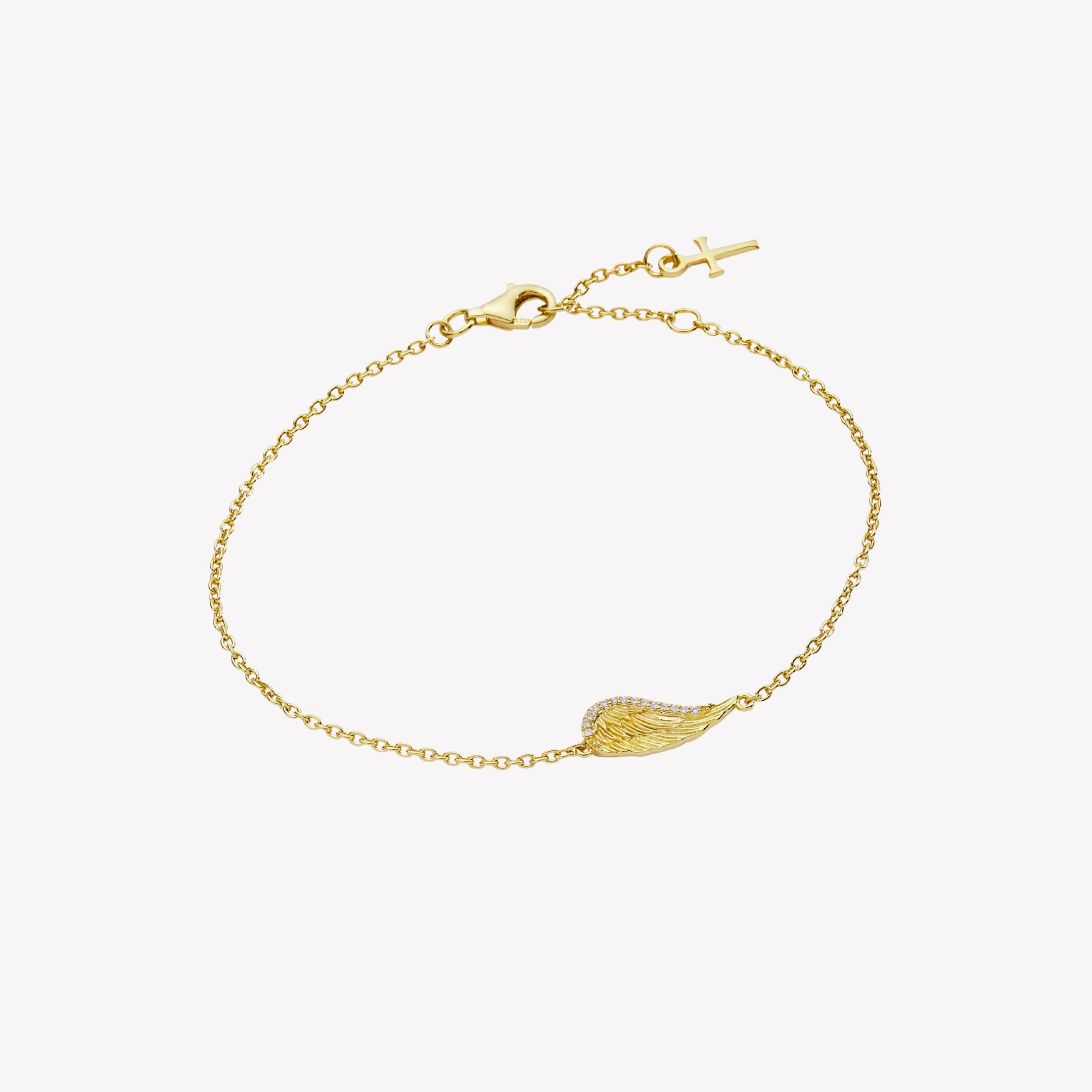 18k gold plated bracelet featuring the divine angel wing motif highly polished with cubic zirconia stone accents on a cable chain with a dainty cross tag by Rizen Jewelry.