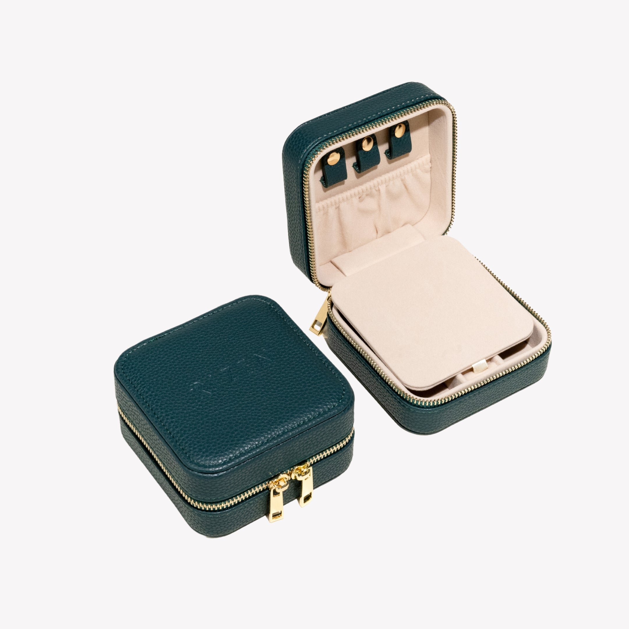 Depth teal green Rizen Jewelry box with upper storage for necklaces or bracelets with 3 leather snaps and elastic pocket and off white velvet interior.