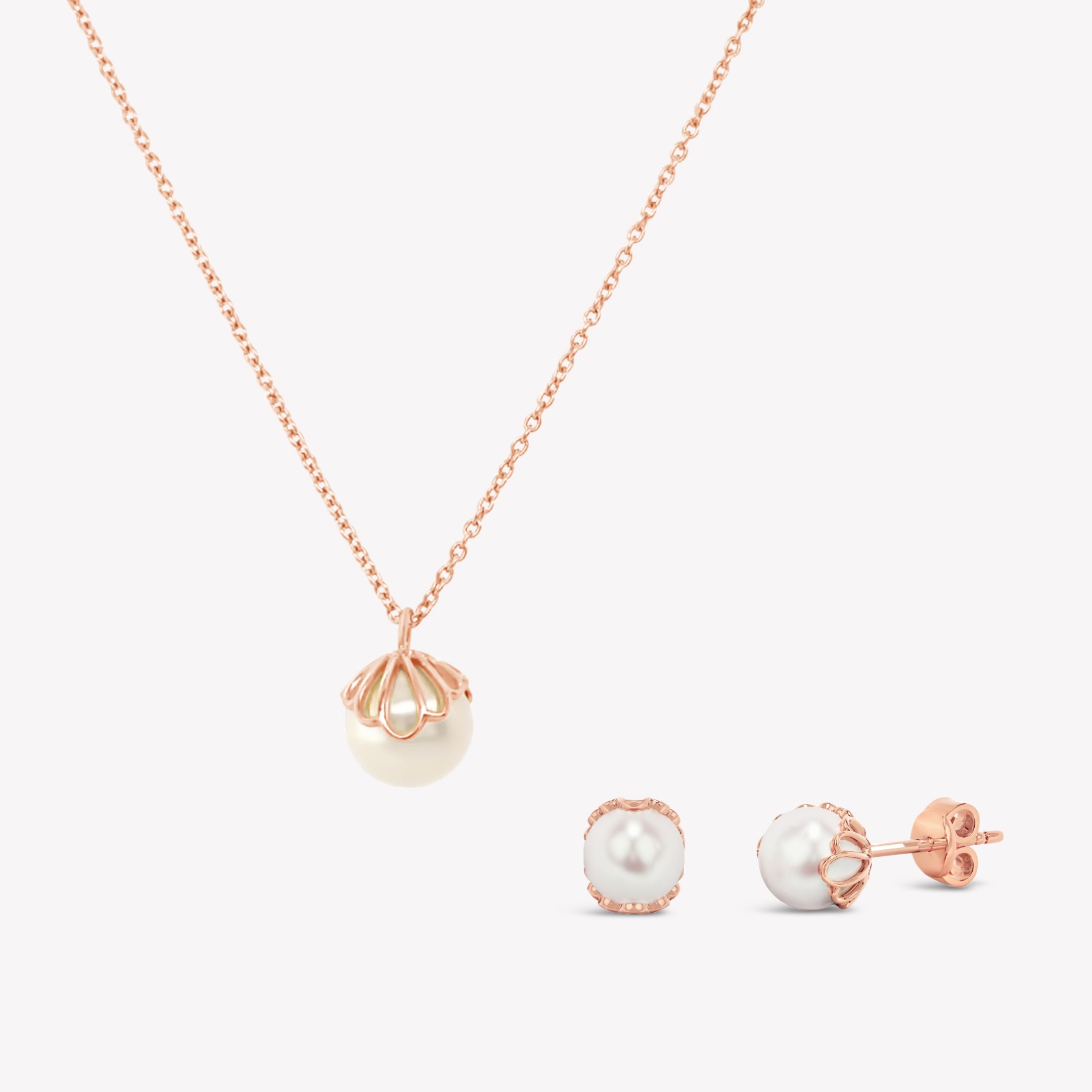 Becoming Necklace Earring Gift Set in 18k rose gold vermeil featuring the natural freshwater pearl shell encased necklace and earrings by Rizen jewelry.