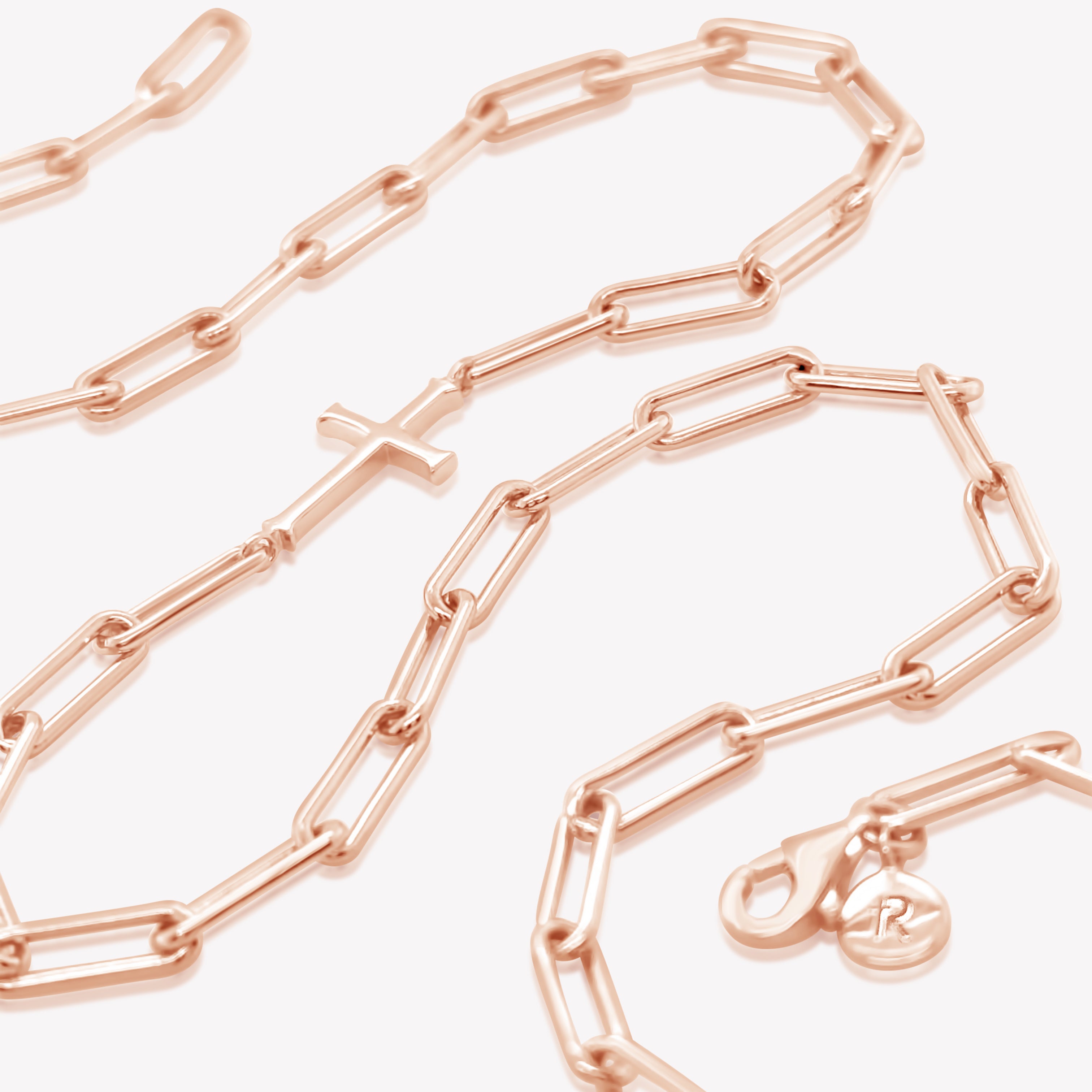 Rizen Jewelry Chain Breaker necklace in 18kt rose gold.  Elegant Cross Pendant breaks up the paper clip link chain with classic lobster clasp  closure.
