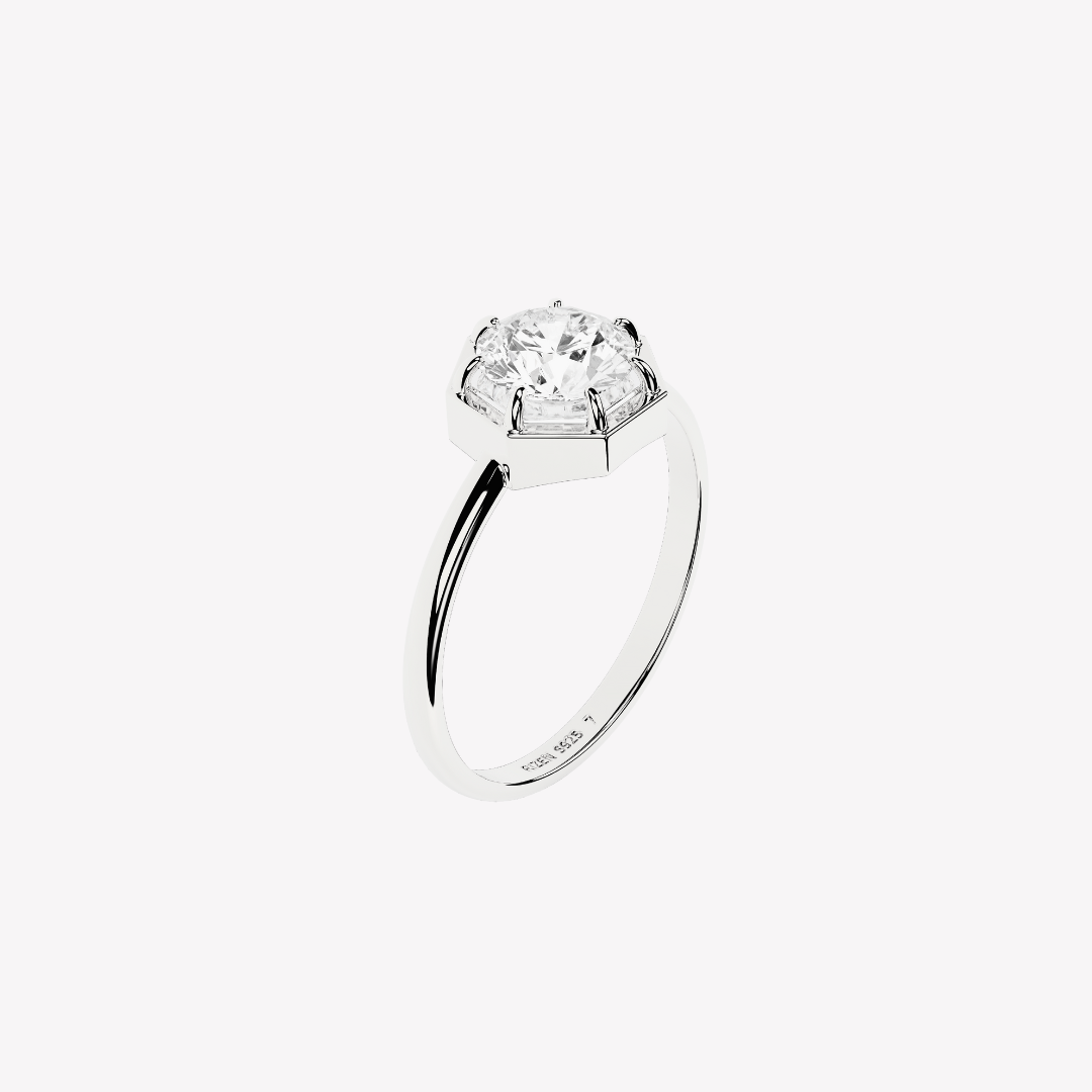 Rizen Jewelry Ebenezer Solitaire white topaz ring set with 7 prongs in sterling silver from the Chispa Collection.