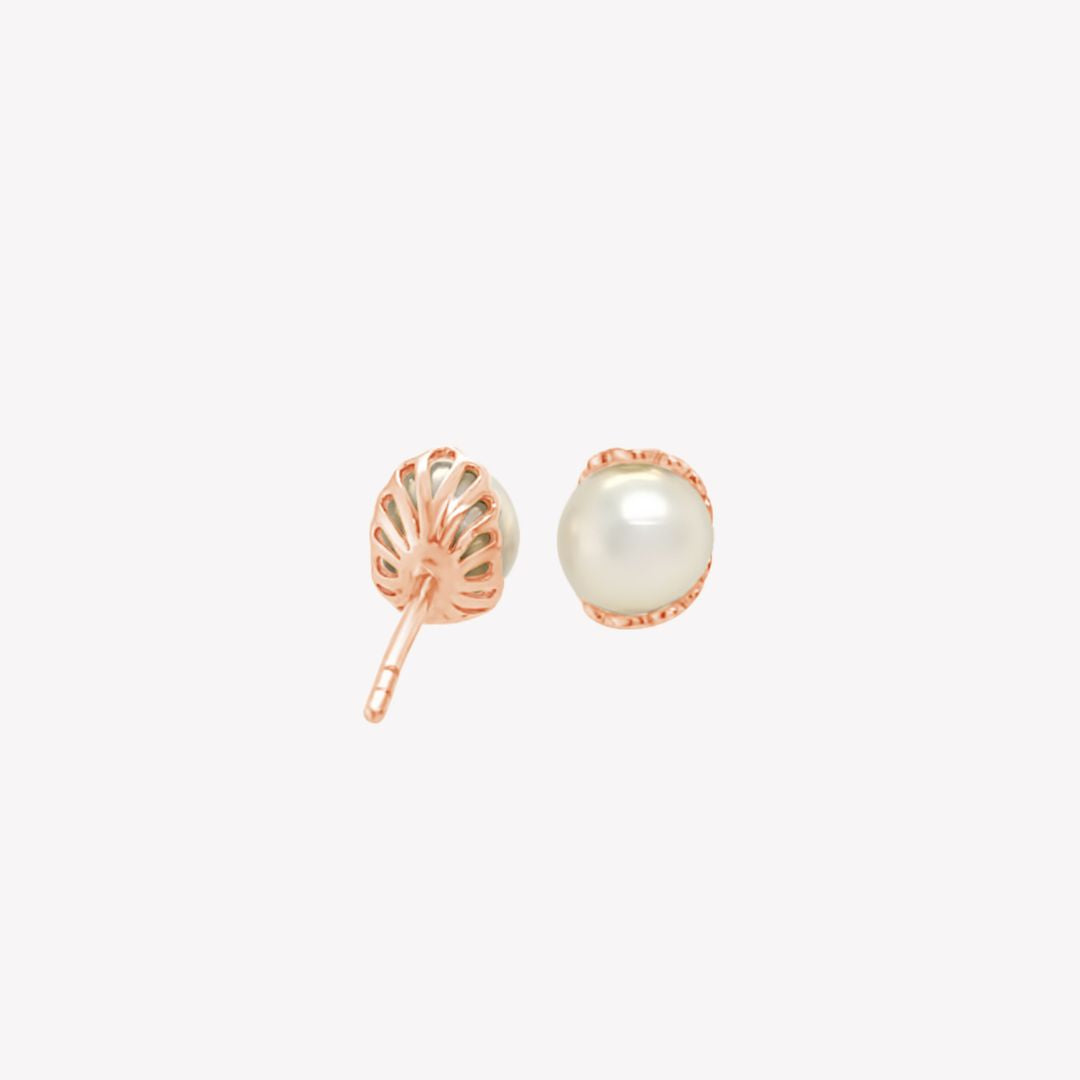 Rizen Jewelry rose gold shell encased pearl earring from the Becoming Collection.
