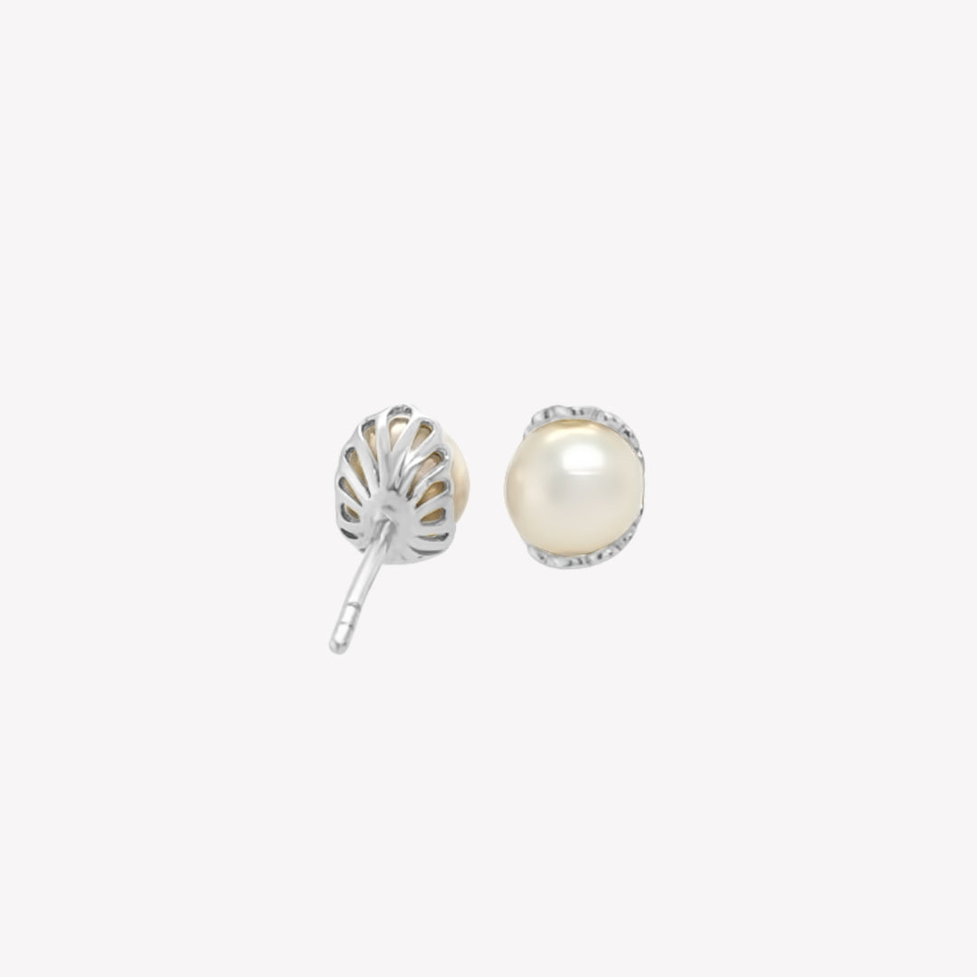 Rizen Jewelry shell encased pearl earring in sterling silver from the Becoming Collection.