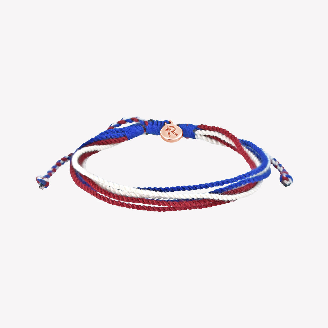Christian Red White and Blue Be Magnified Peaceful Friendship bracelet with Rose Gold Rizen Jewelry and Made 4 Ministries tag.