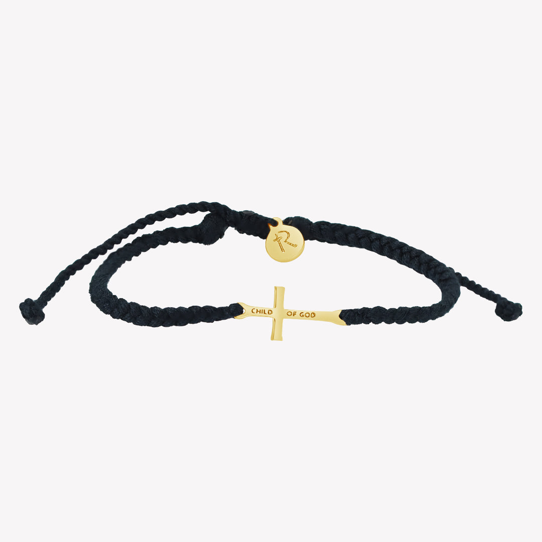 Made 4 Ministries Child of God gold cross bracelet braided black cotton cords by Rizen Jewelry