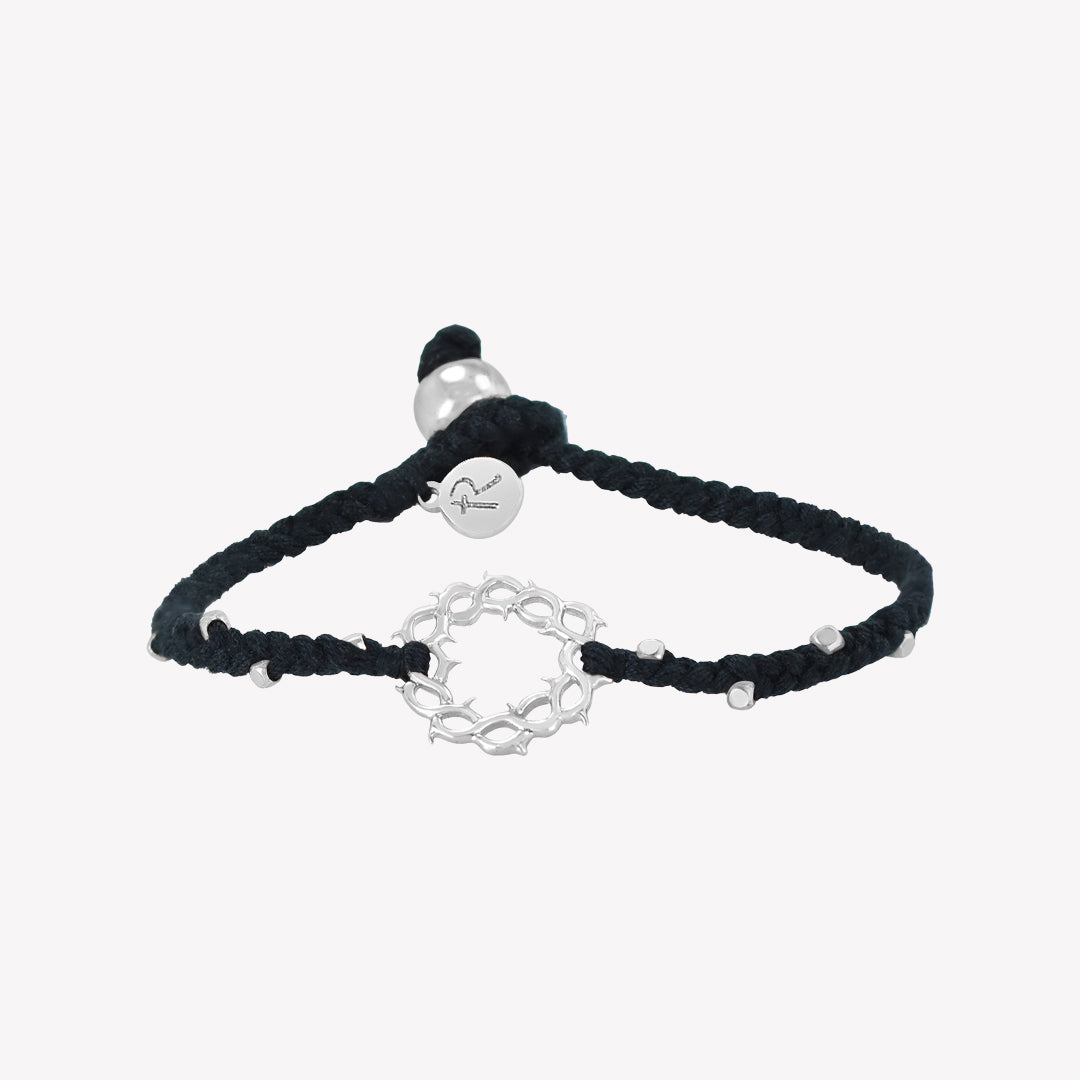 Christian inspired black braided friendship bracelet with silver crown of thorns pendant and 8 dainty beads with a pumpkin bead closure and a Rizen Jewelry Made 4 Ministries round tag