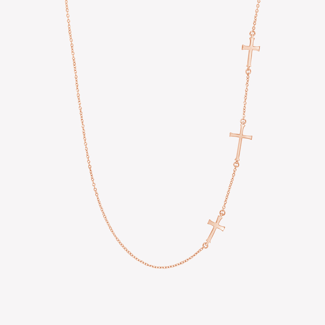 Rizen Jewelry  Calvary Cross Necklace with 3 sideways crosses on dainty cable chain in rose gold vermeil finish.