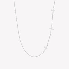 Rizen Jewelry Calvary Cross Necklace with 3 sideways Christian crosses on dainty cable chain in sterling silver.
