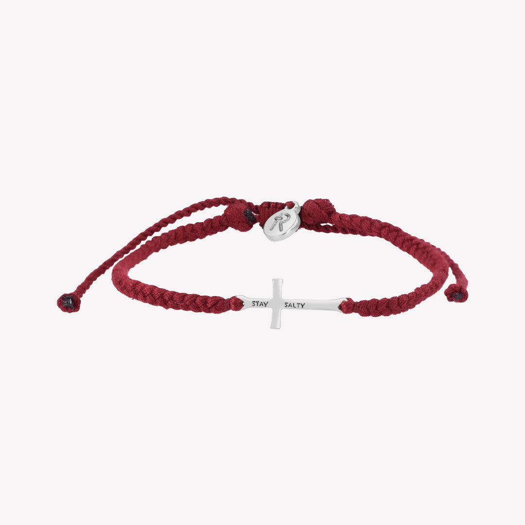 Christian silver cross bracelet engraved "STAY SALTY" hand braided garnet red cotton cords by Rizen Jewelry Made 4 Ministries collection.