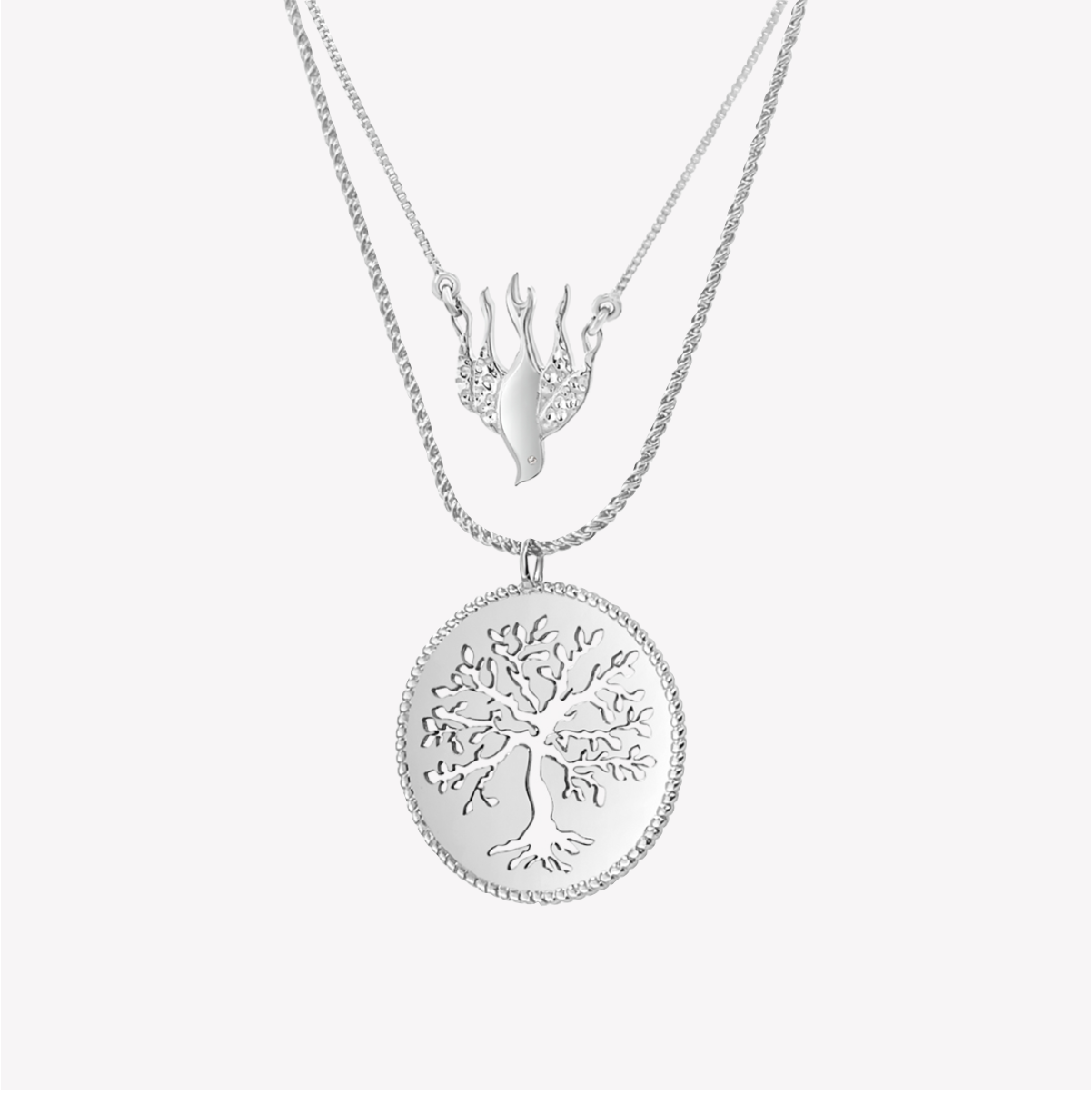 Silver Rooted in the Spirit Necklace jewelry set by Rizen Jewelry. Features Chispa de la dove and Olive tree necklaces. 