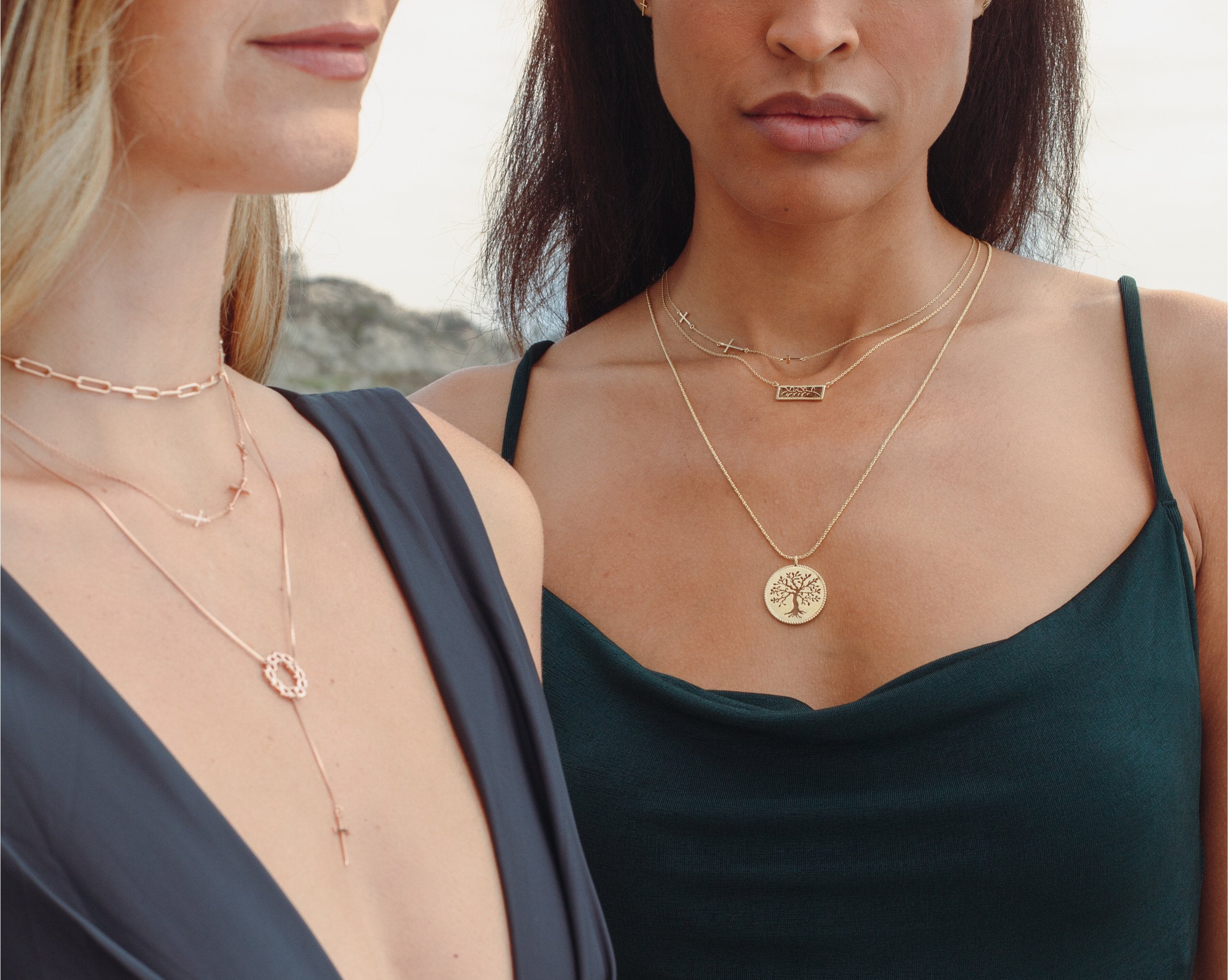 Women wearing gold vermeil Christian necklaces. Crown of Thorns necklace, Olive Tree and Branch Necklaces and Cross Necklaces on chain