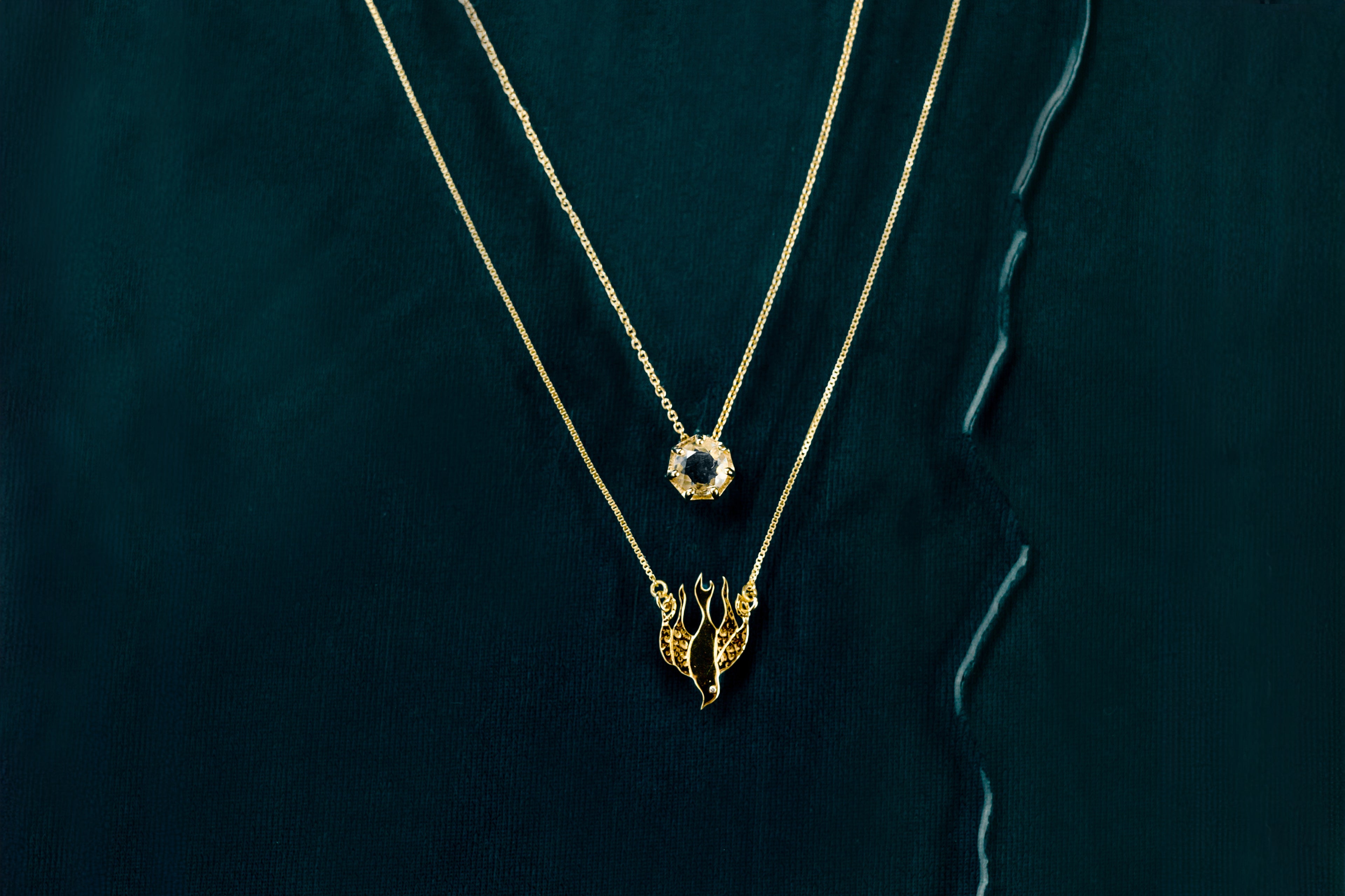 Women wearing gold vermeil Christian necklaces. Crown of Thorns necklace, Olive Tree and Branch Necklaces and Cross Necklaces on chain