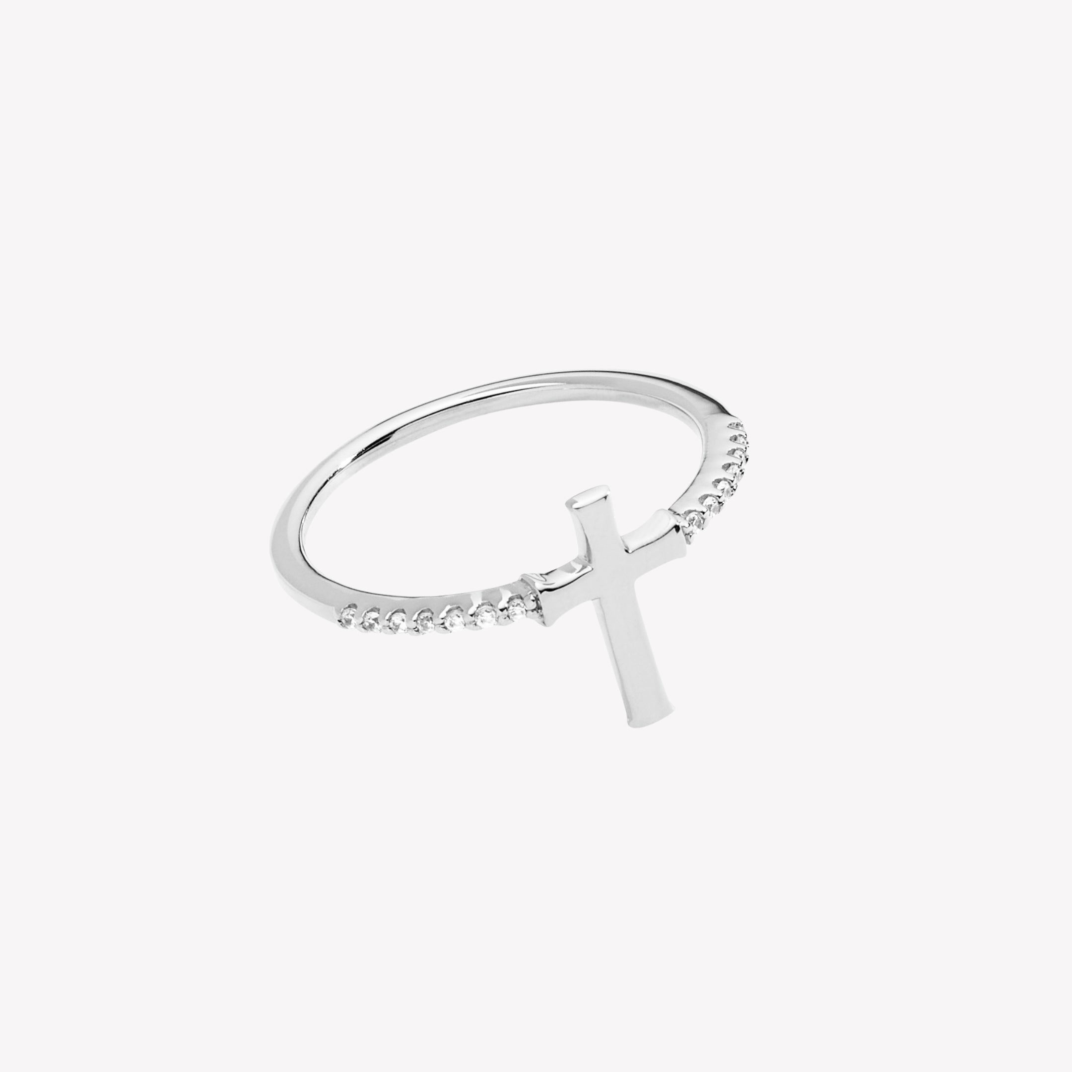 Sterling silver ring showcasing a cross motif centered between seven sparkling micro-set pavé zirconias on either side of the band from the Calvary Collection by Rizen Jewelry.
