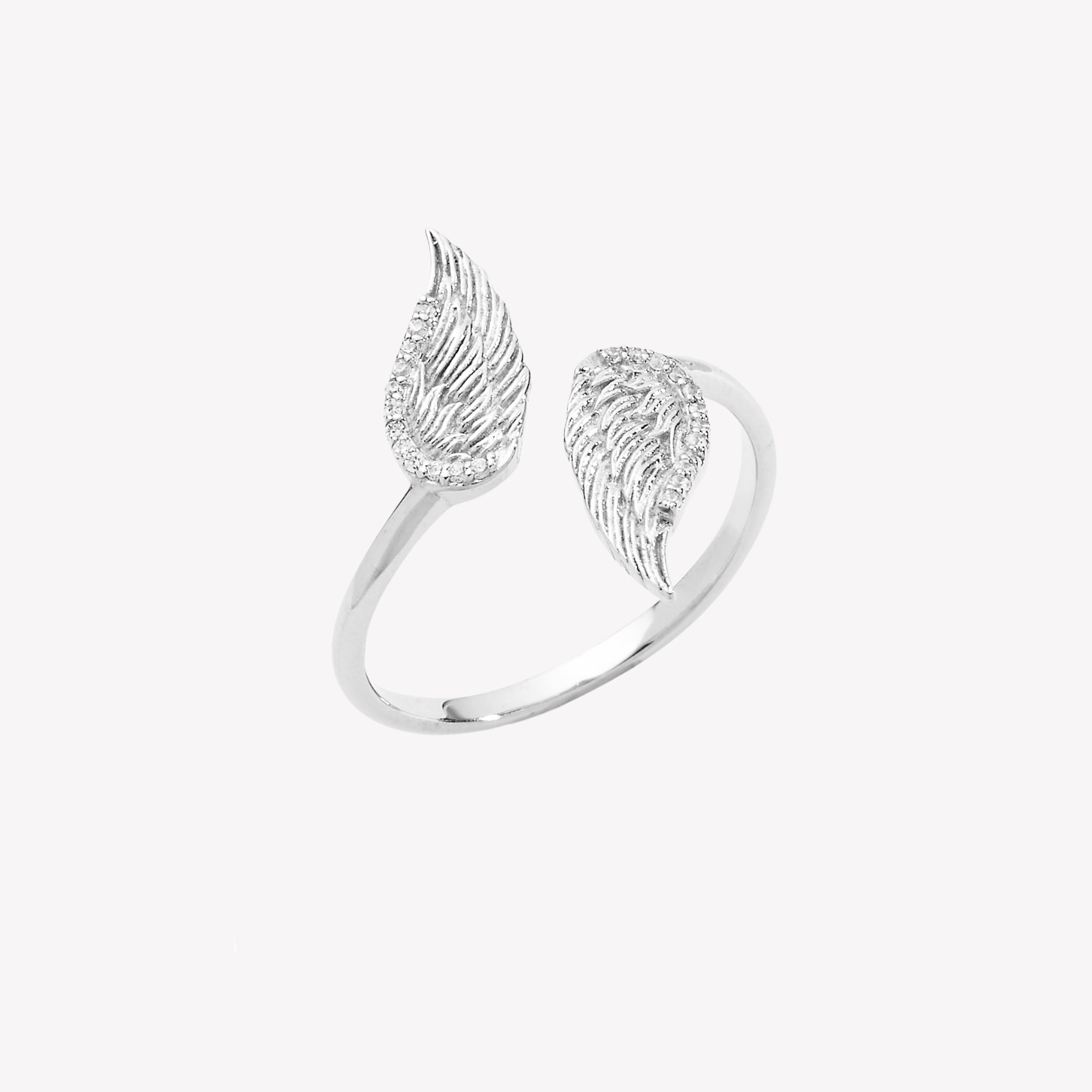 Crafted in sterling silver this ring showcases captivating double angel wing motifs, elegantly outlined with sparkling cubic zirconia accents from the Insignia Collection by Rizen Jewelry.