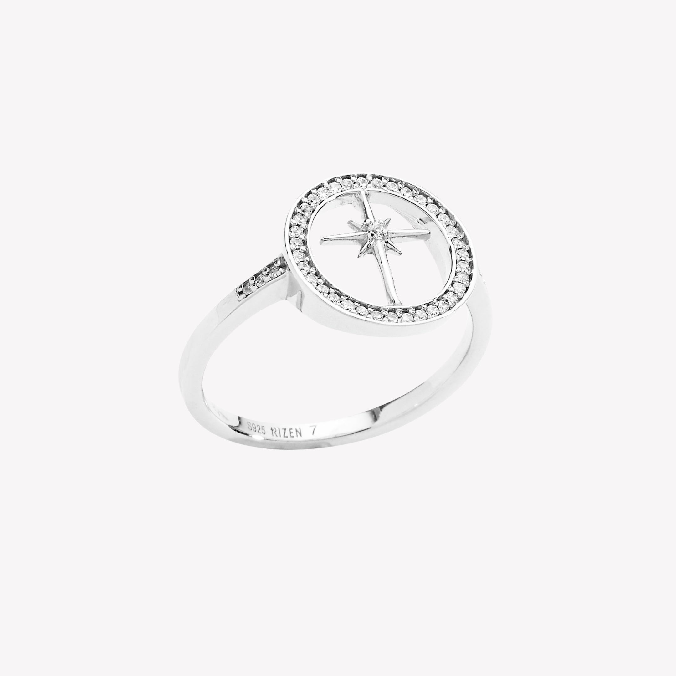 Sterling silver Adoring Star Compass Ring featuring 41 flush-set stones along the circular border and band from the Insignia Collection by Rizen Jewelry. 