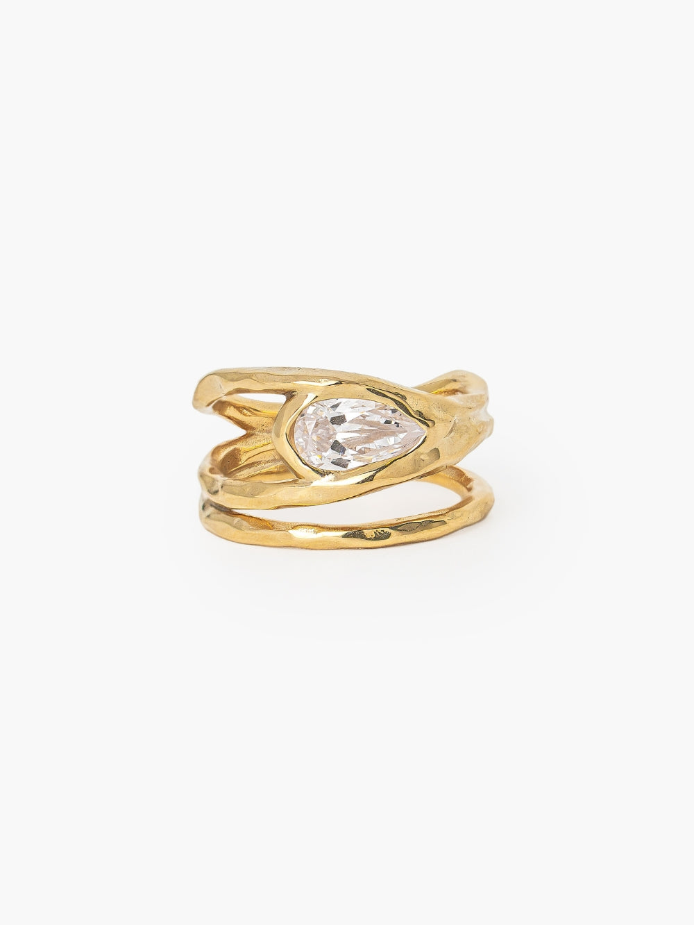 Rizen Jewelry Solace Teardrop Statement Ring has a tear-shaped simulated diamond framed within a hammer-textured setting, crafted with soft, reflective fluid curves. Sterling silver finished in 18k gold.