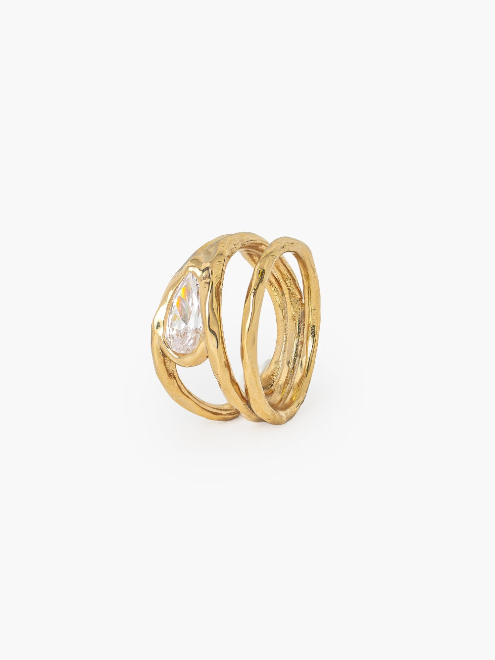 Rizen Jewelry Solace Teardrop Statement Ring has a tear-shaped simulated diamond framed within a hammer-textured setting, crafted with soft, reflective fluid curves. Sterling silver finished in 18k gold.