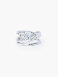 A tear-shaped simulated diamond ring framed within a hammer-textured setting, crafted with soft, reflective fluid curves. The Rizen Jewelry Solace Teardrop Statemnet Ring is crafted in sterling silver.