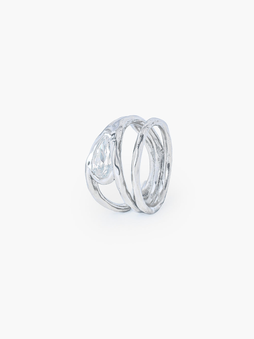 A tear-shaped simulated diamond ring framed within a hammer-textured setting, crafted with soft, reflective fluid curves. The Rizen Jewelry Solace Teardrop Statemnet Ring is crafted in sterling silver.