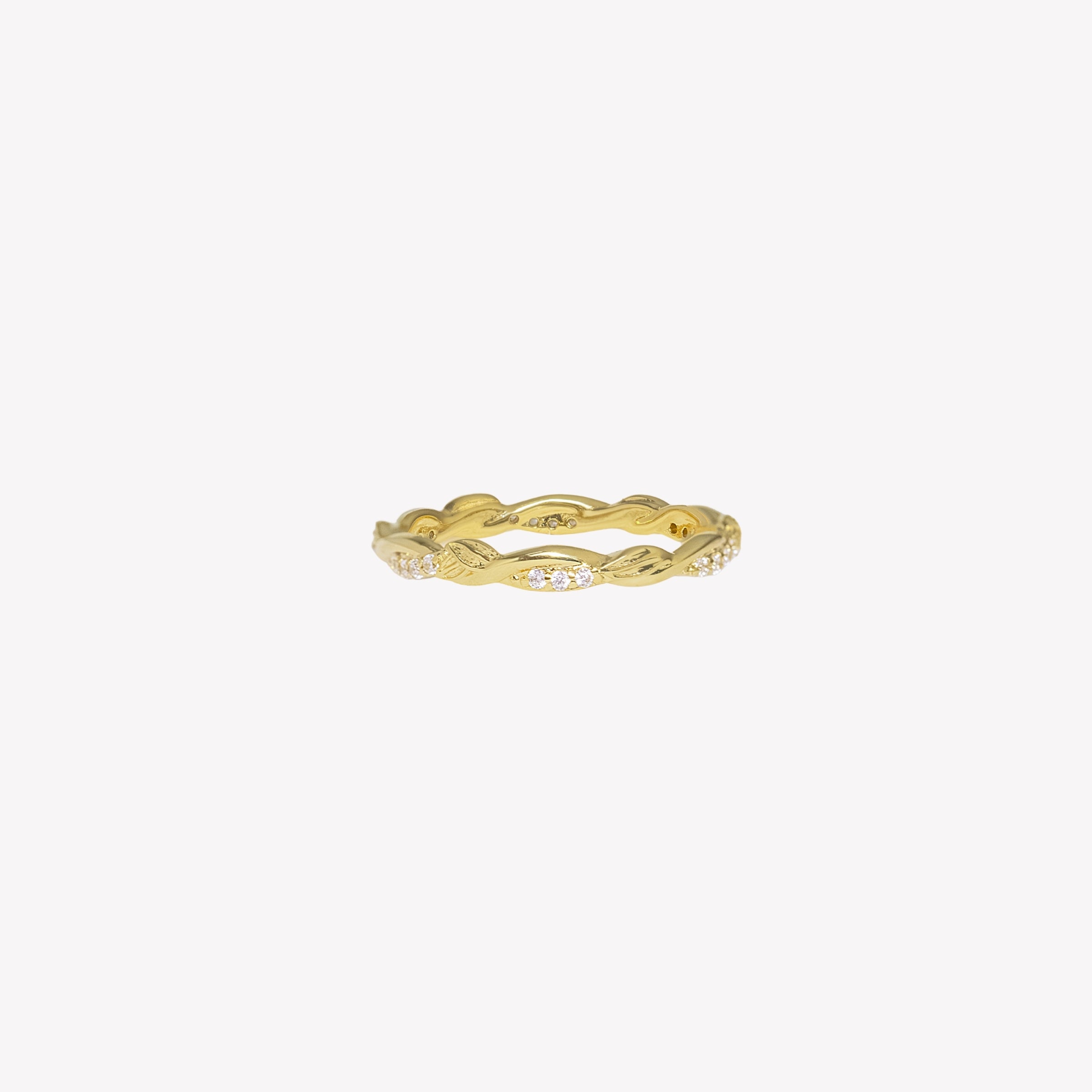18k gold plated sacred vine band ring with sparkling cubic zirconias and delicate olive leaves intertwined on the band. 