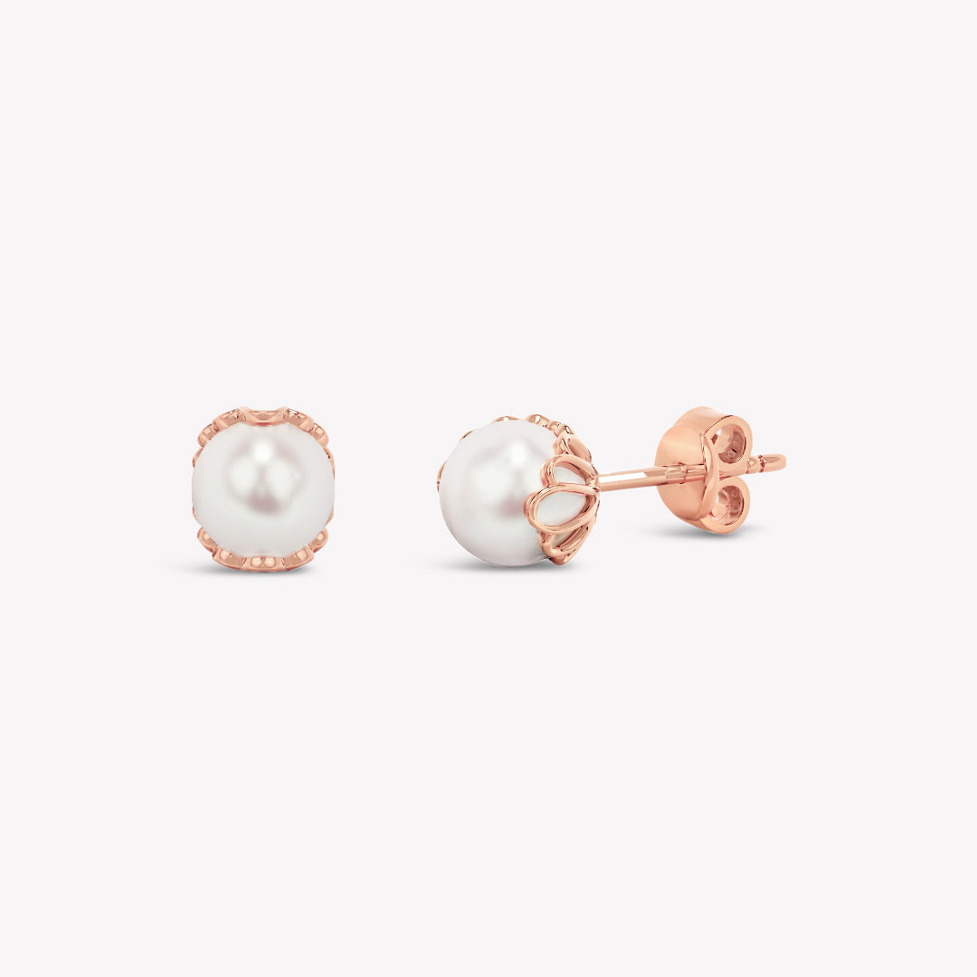 Rizen Jewelry shell encased pearl earring in rose gold vermeil from the Becoming Collection.