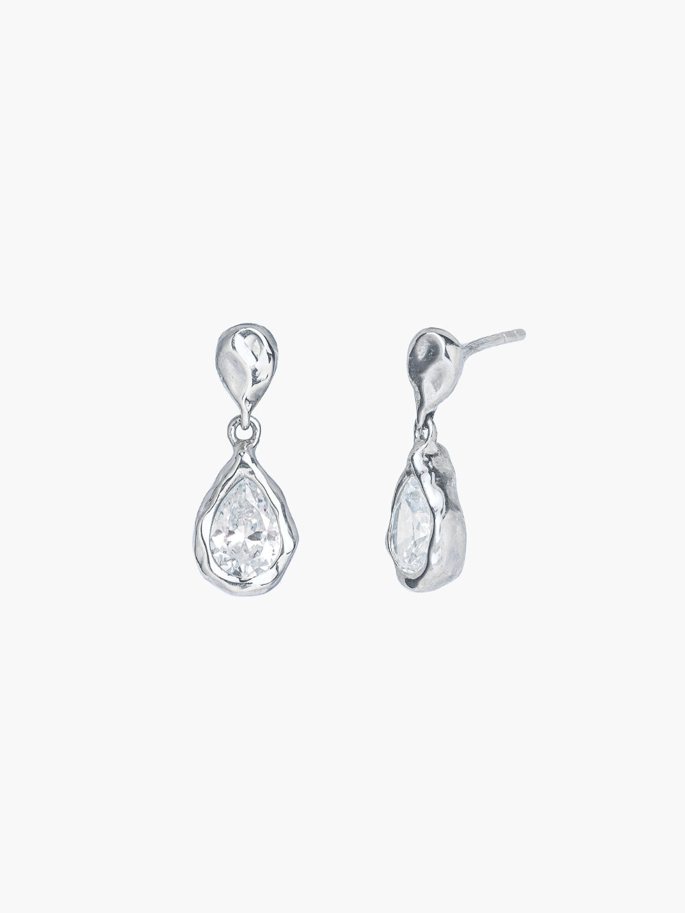 Rizen Jewelry Solace Tear Drop Dangle Earrings in Sterling Silver feature a teardrop simulated diamond nestled within a fluid hammer texture that elegantly dangle from a fluid reverse tear drop formig an infity shape. 