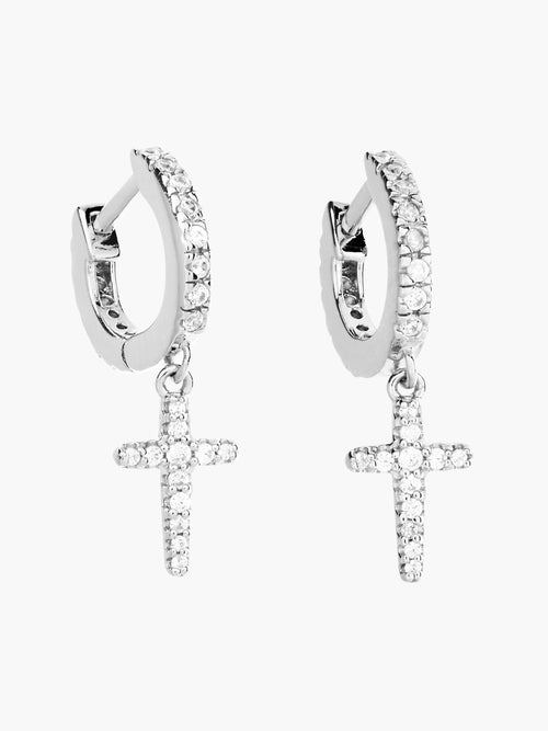 Luminous cross huggie hoop earrings in sterling silver from the Calvary collection. A wonderful Christian Jewelry Gift by Rizen Jewelry.