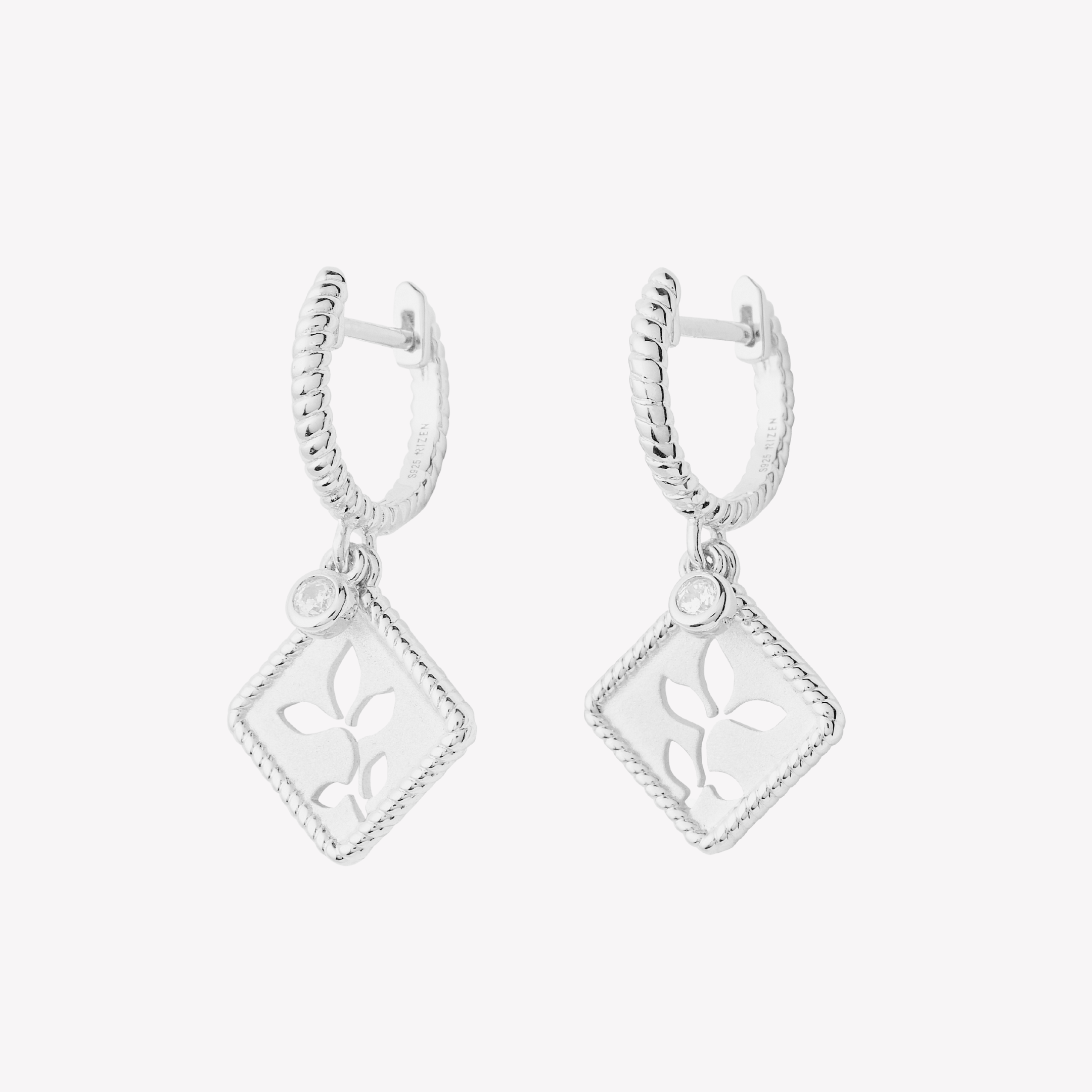  Olive Leaf Hoop Earrings in sterling silver feature twisted rope hoops with diamond shaped pendants with subtle a matte finish, intricate rope borders, and delicate cubic zirconias are the perfect addition to the Rooted Collection by Rizen Jewelry. 
