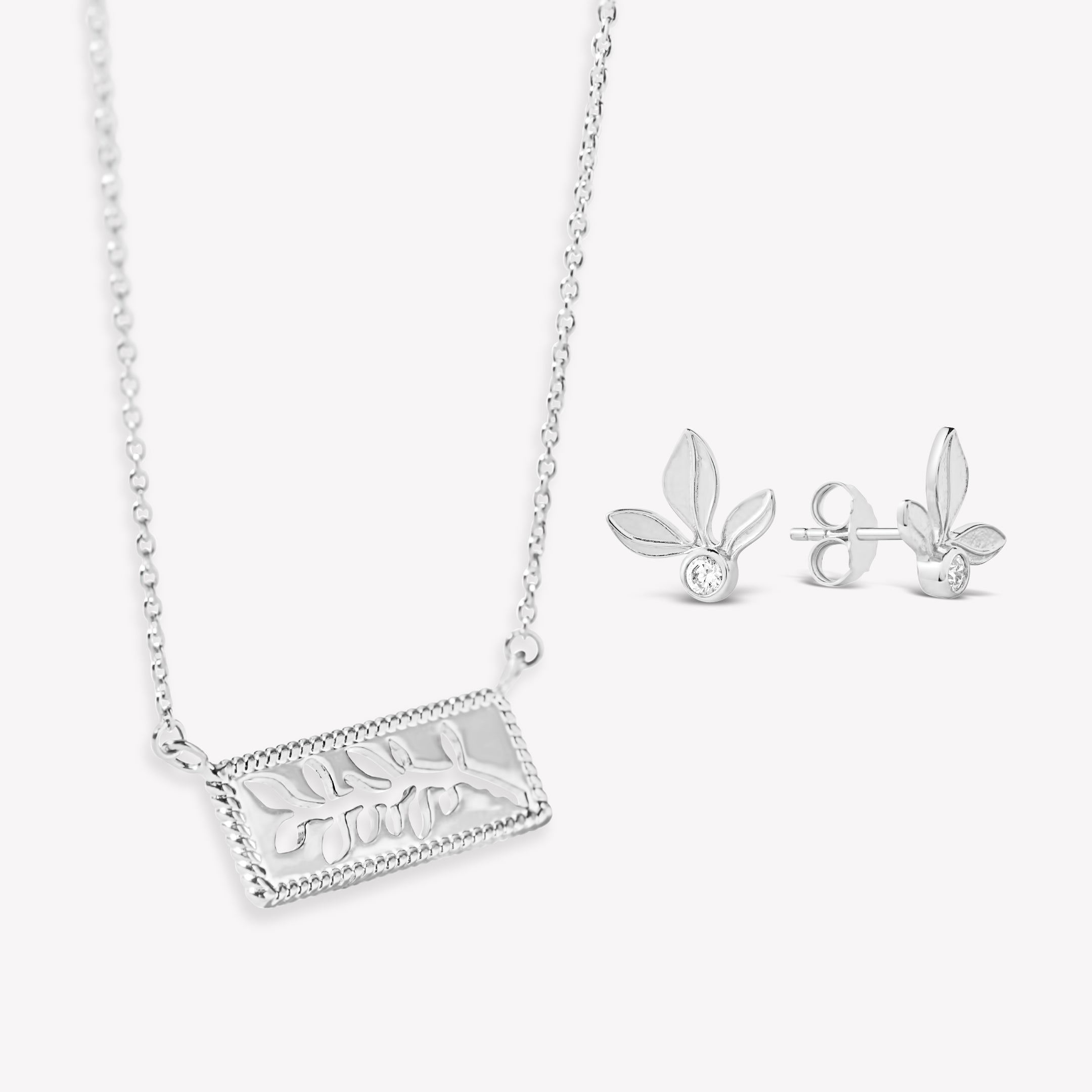 Serene Reverence Jewelry Set in sterling silver featuring the exquisite Olive Leaf Earrings and beautiful Branch Necklace make a perfect gift from the Rooted Collection by Rizen Jewelry. 