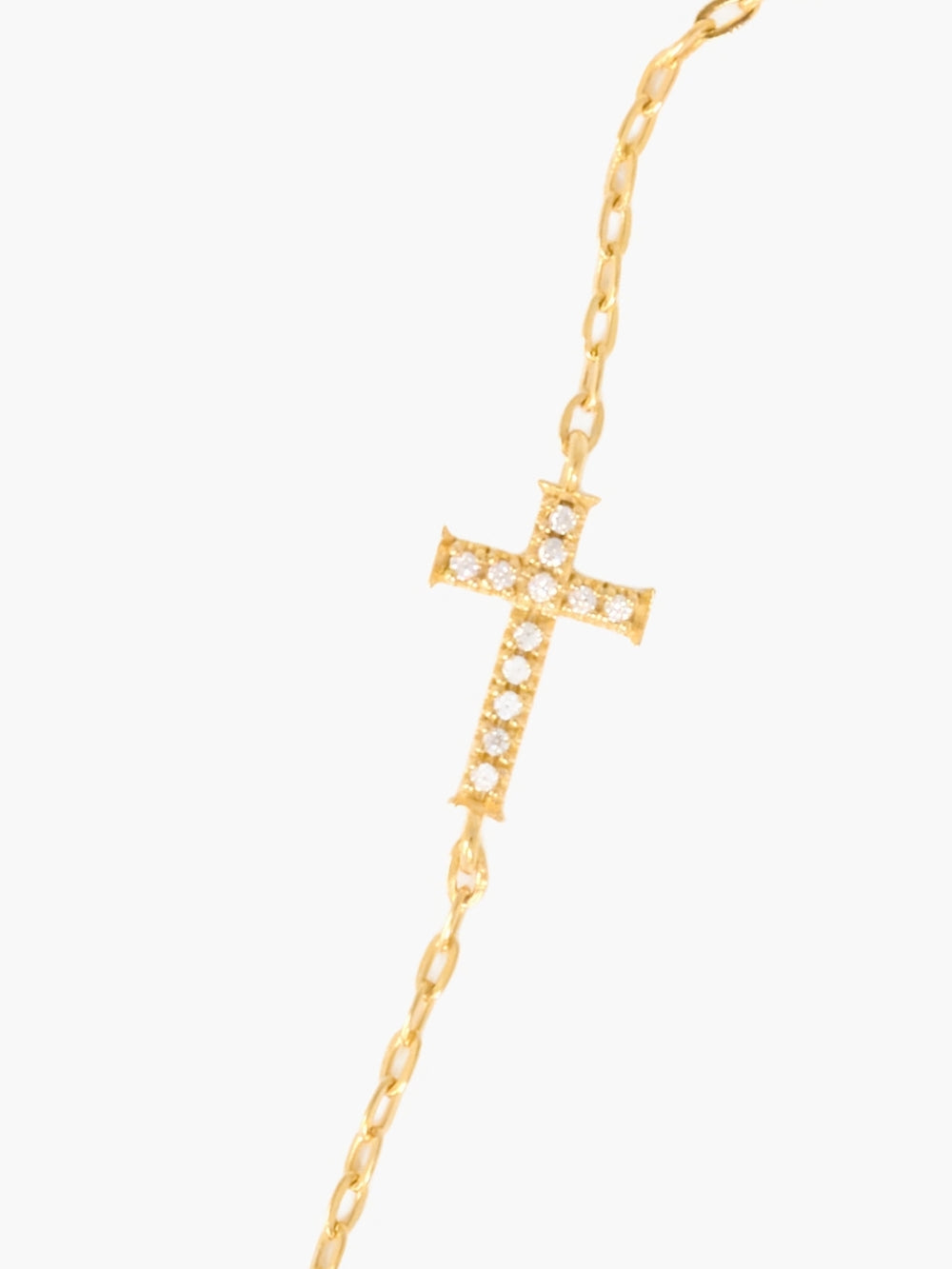 Close-up of pavé-set Rizen Cross pendant, 8mm by 12mm, on 18k gold-plated micro paper clip link chain
