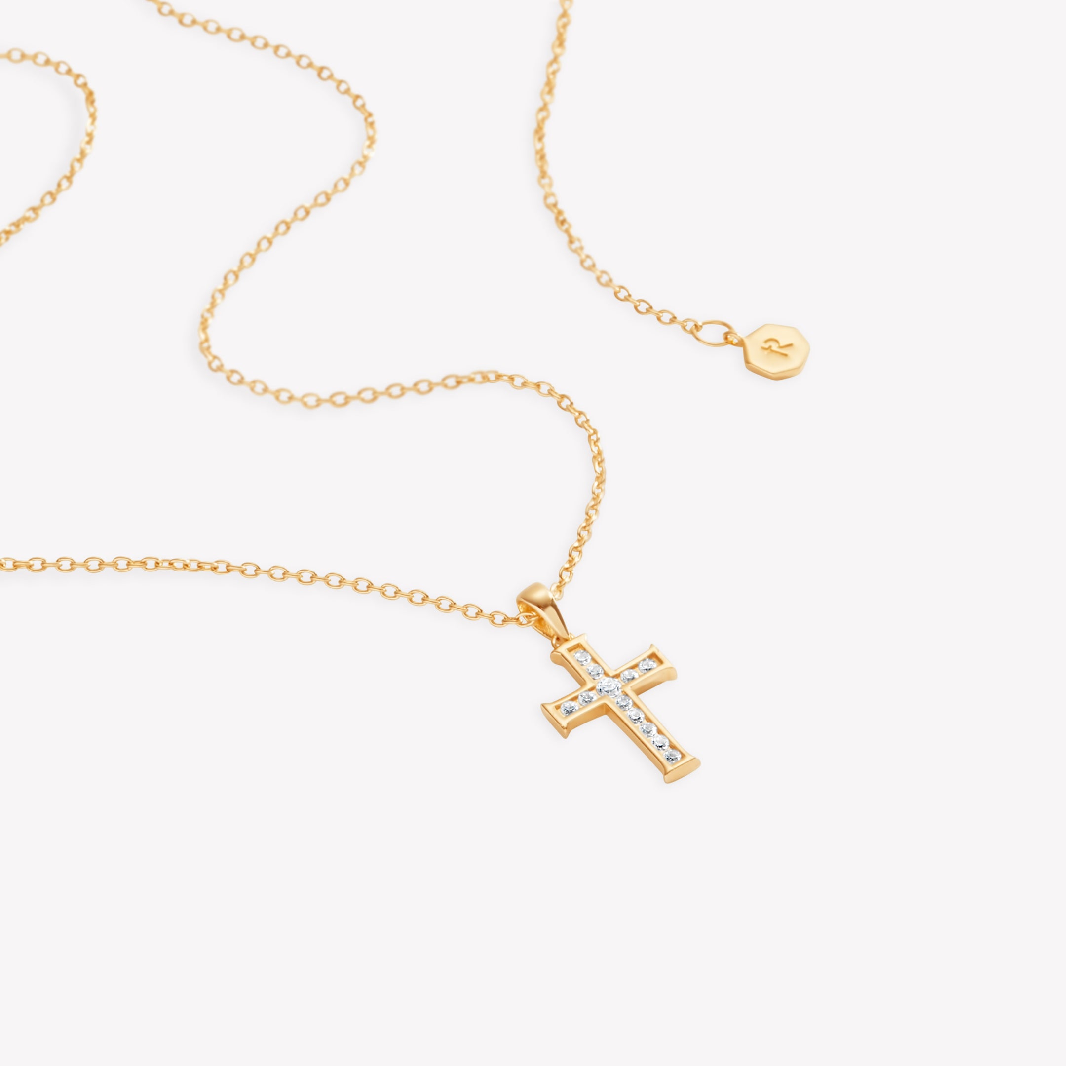 18k gold vermeil luminous cross pendant necklace featuring 12 sparkling cubic zirconia channel set on an adjustable 20" cable chain by Rizen Jewelry