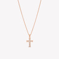 Luminous cross pendant necklace in 18k rose gold from the Calvary collection by Rizen Jewelry.  A timeless baptism gift.
