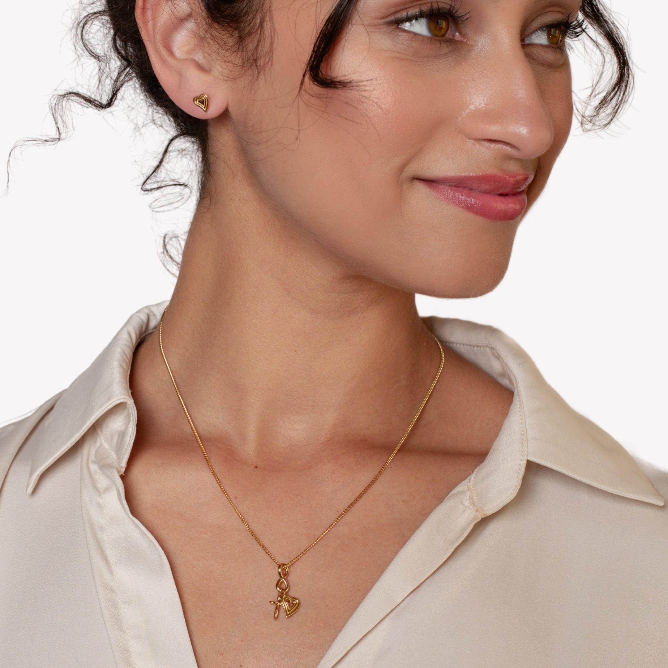 Faith Hope Love Jewelry Gift Set in 18k gold vermeil  featuring the Faith Hope Love Necklace and Emanate Love Earrings worn by Rizen Jewelry Christian female model. 