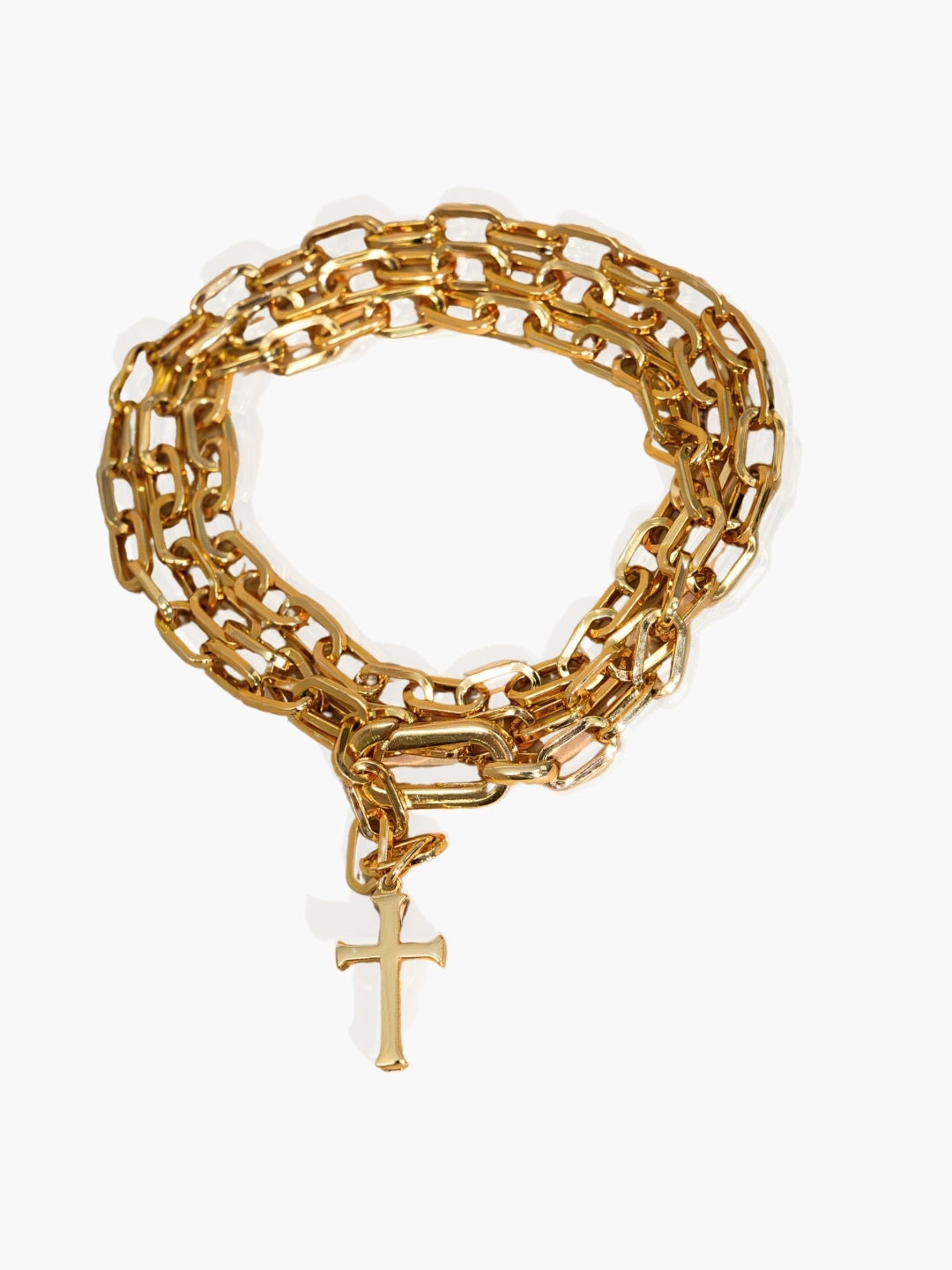 Gold versatile convertible chain breaker wrap cross necklace. styled as a bracelet. This elegant design wraps around the neck or wrist to create a sleek, refined expression of faith.