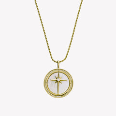18k gold plated compass medallion necklace with mother-of-pearl inlay and John 14:6 scripture etched on the back. Pendant set on a 21in adjustable rope chain. There is a channel set cubic zirconia boarder around the compass pendant. 