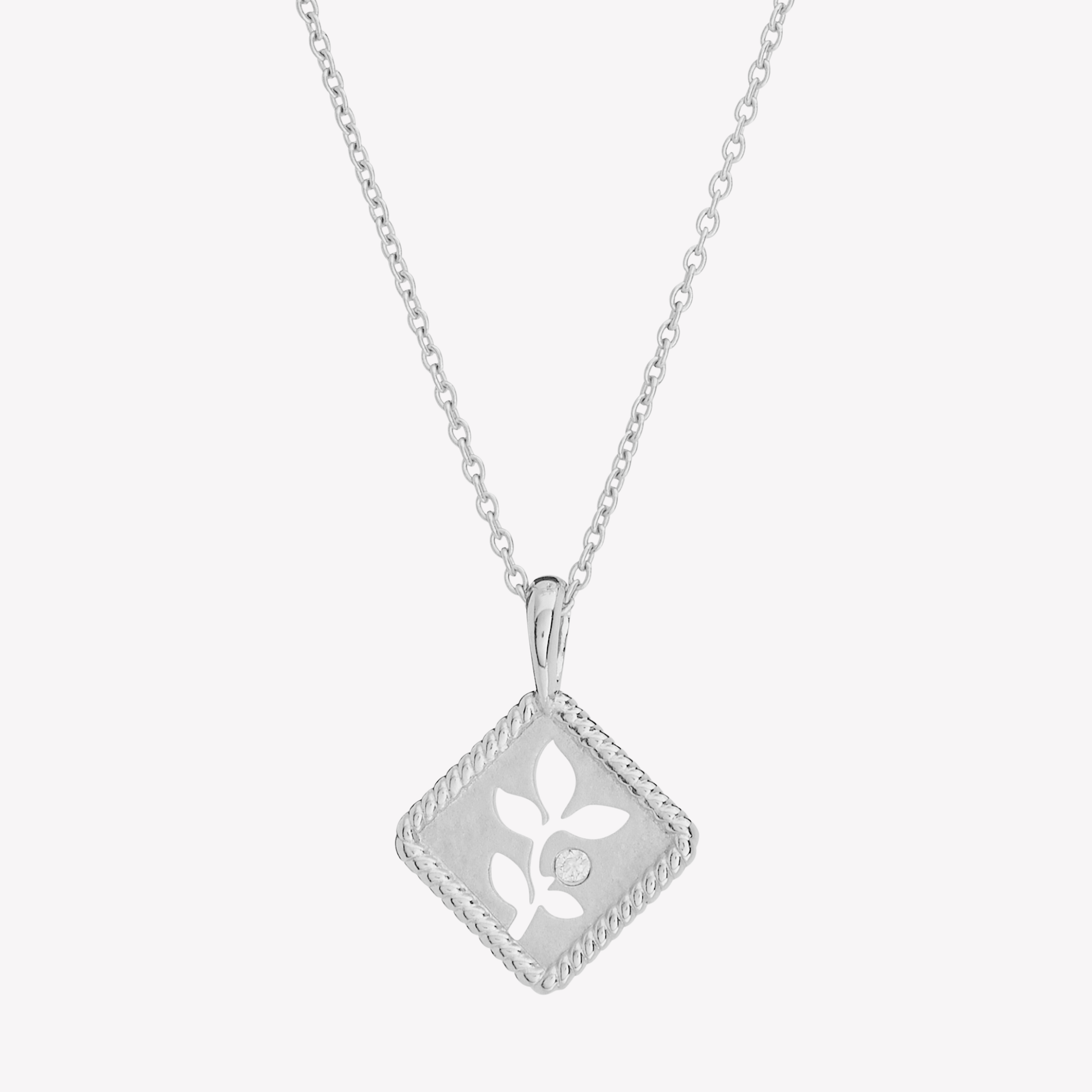 Olive Leaf Necklace in sterling silver features a pendant with  a subtle matte finish, intricate rope borders, and delicate cubic zirconias set on a cable chain from the Rooted Collection by Rizen Jewelry. 