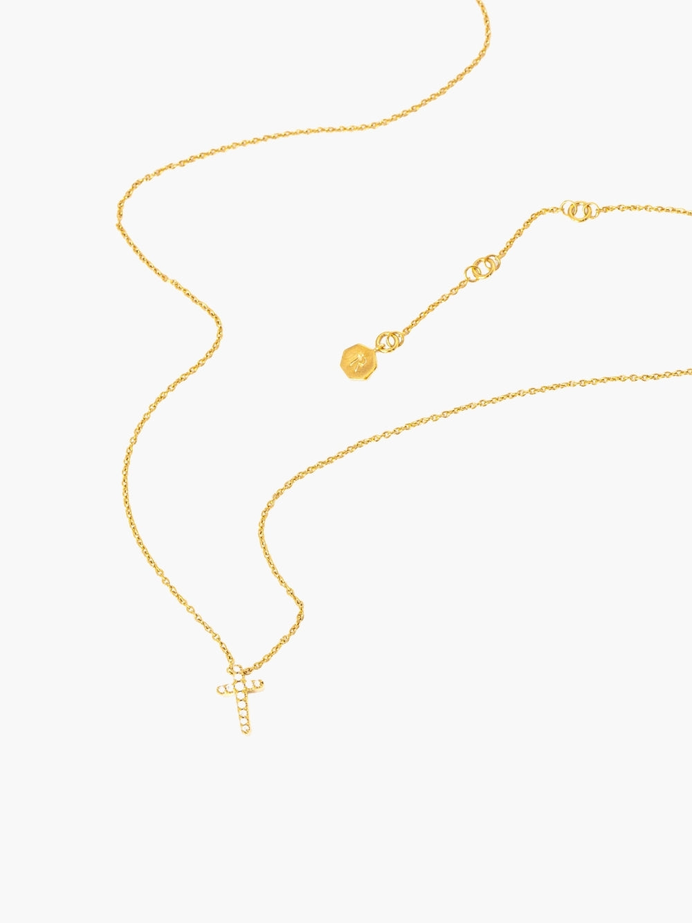  the Dainty Luminous Cross Pavé Pendant Necklace showing three length settings on an 18-inch chain designed by Rizen Jewelry