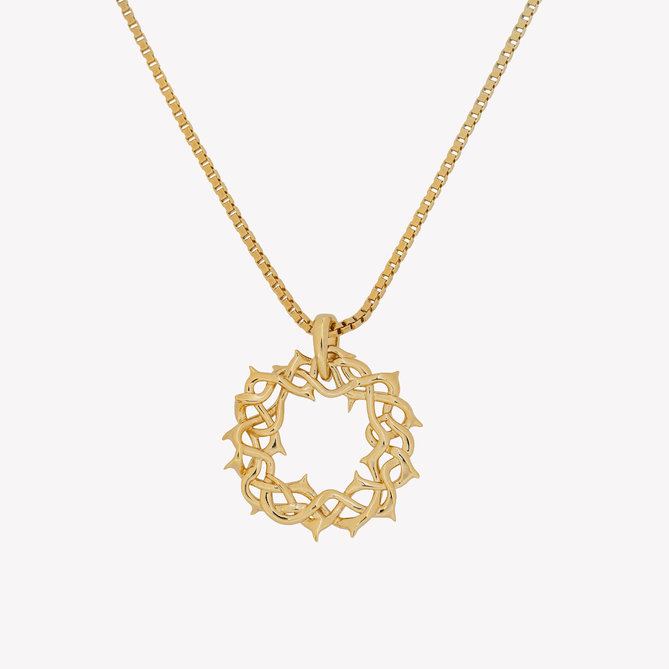 Large Crown of Thorns Pendant Necklace in 18k gold vermeil hangs from a bold box chain. 