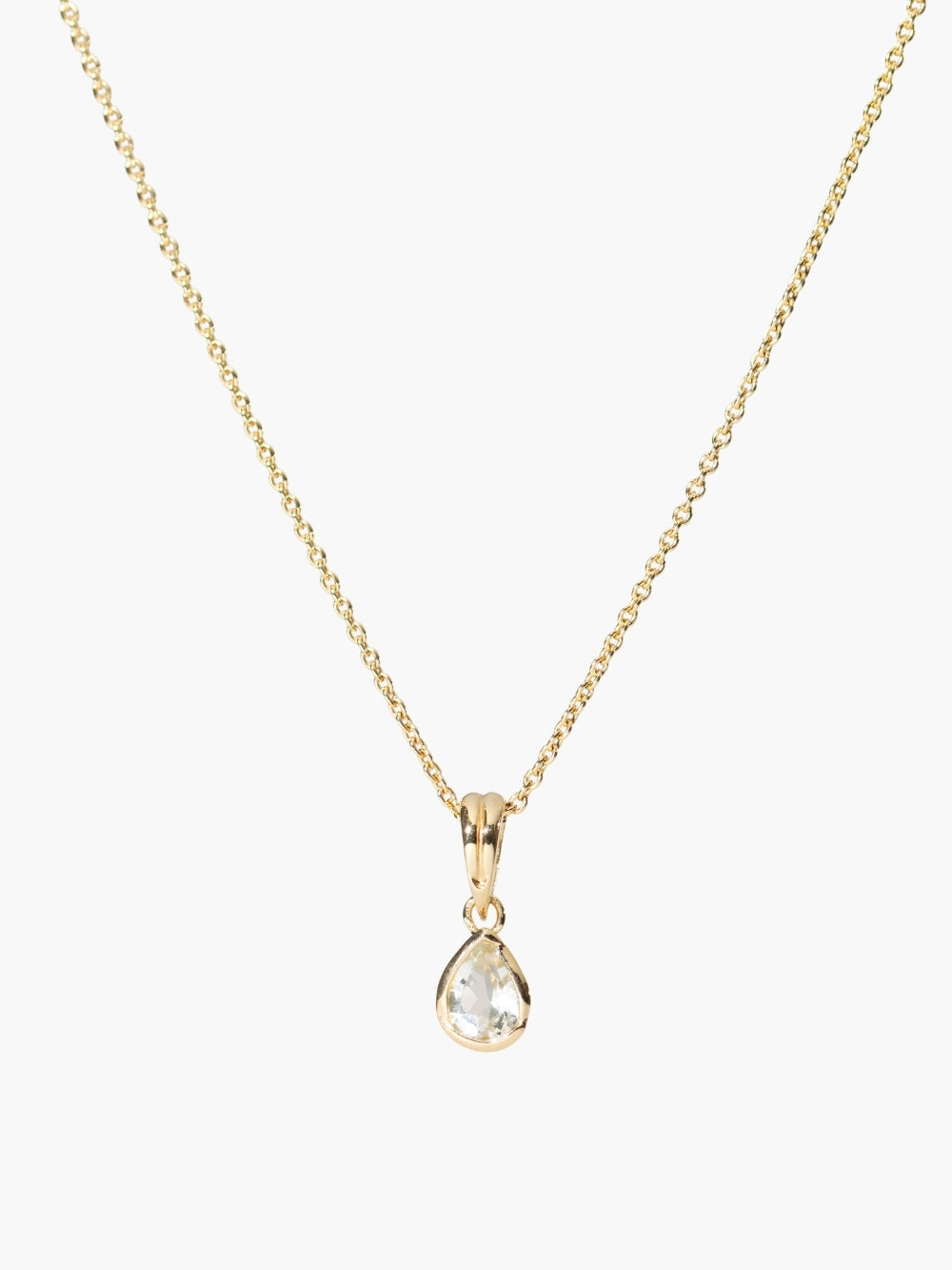 Rizen Jewelry Green Quartz Fully Known Prayer Pendant cradled in an 18 karat gold plated finish on a cable chain. 