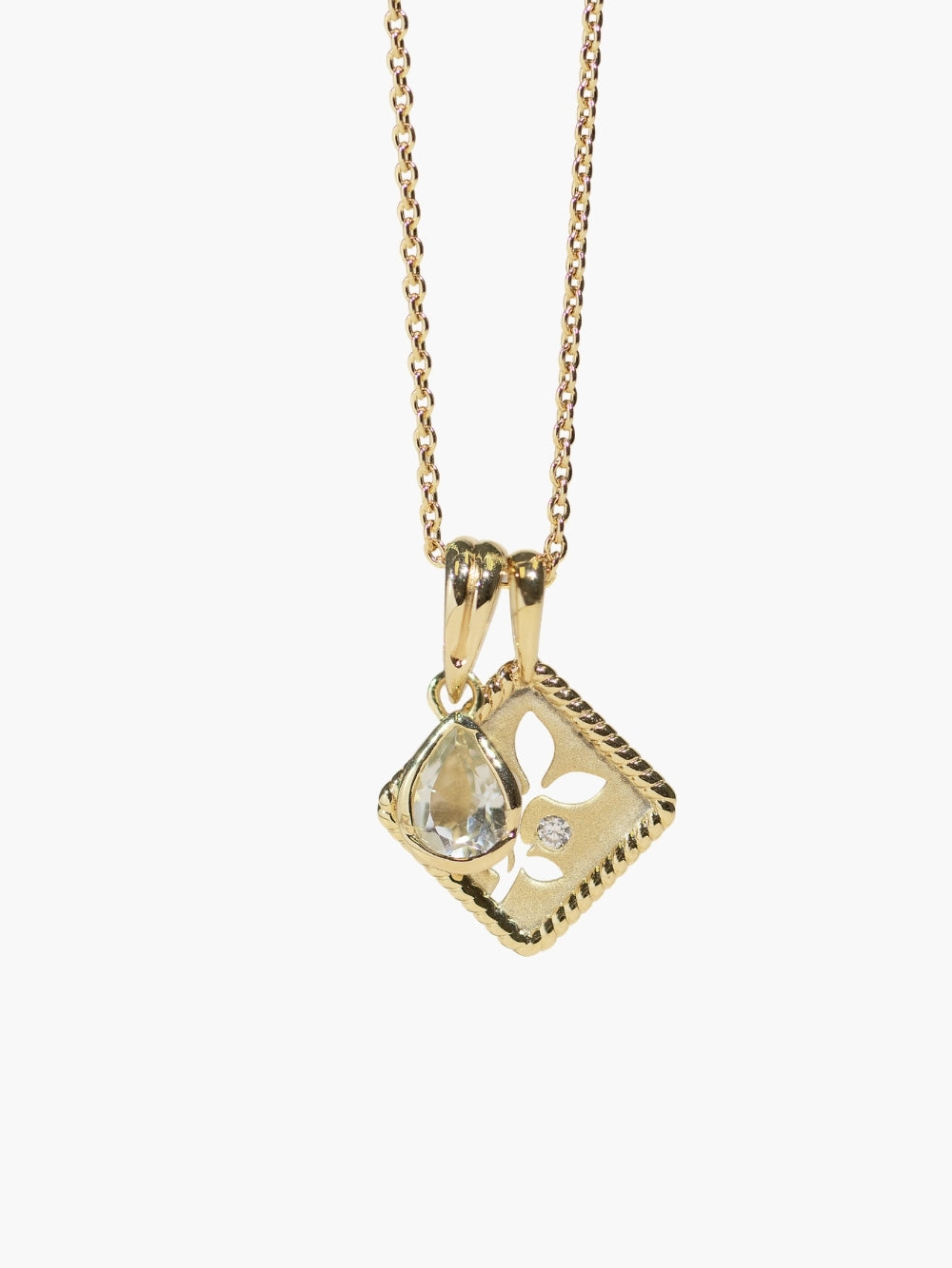 Rizen Jewelry Green Quartz Fully Known Prayer Pendant cradled in an 18 karat gold plated finish layered on the olive leaf pendant necklace 